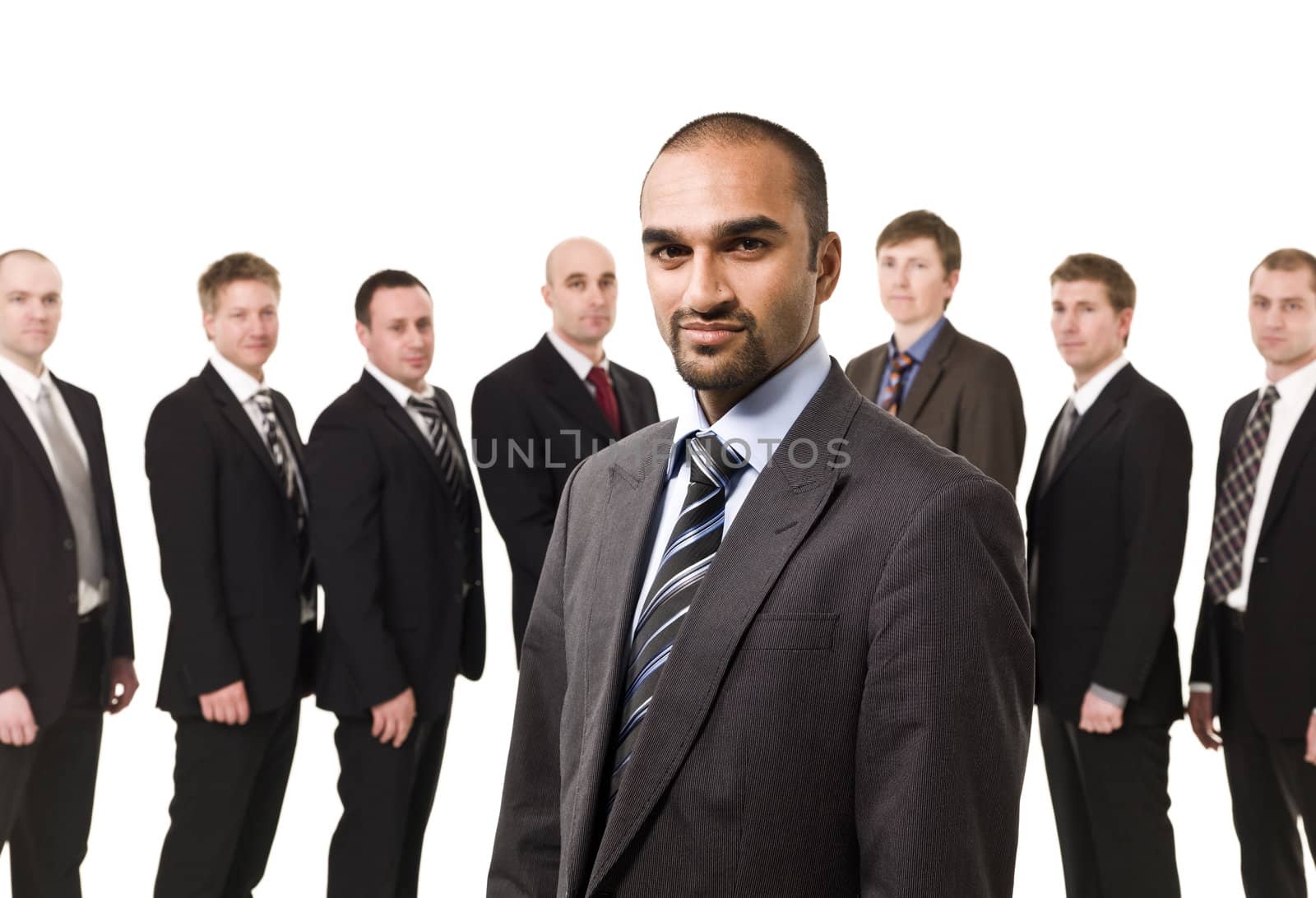 Business Manager in front of his team isolated on white background