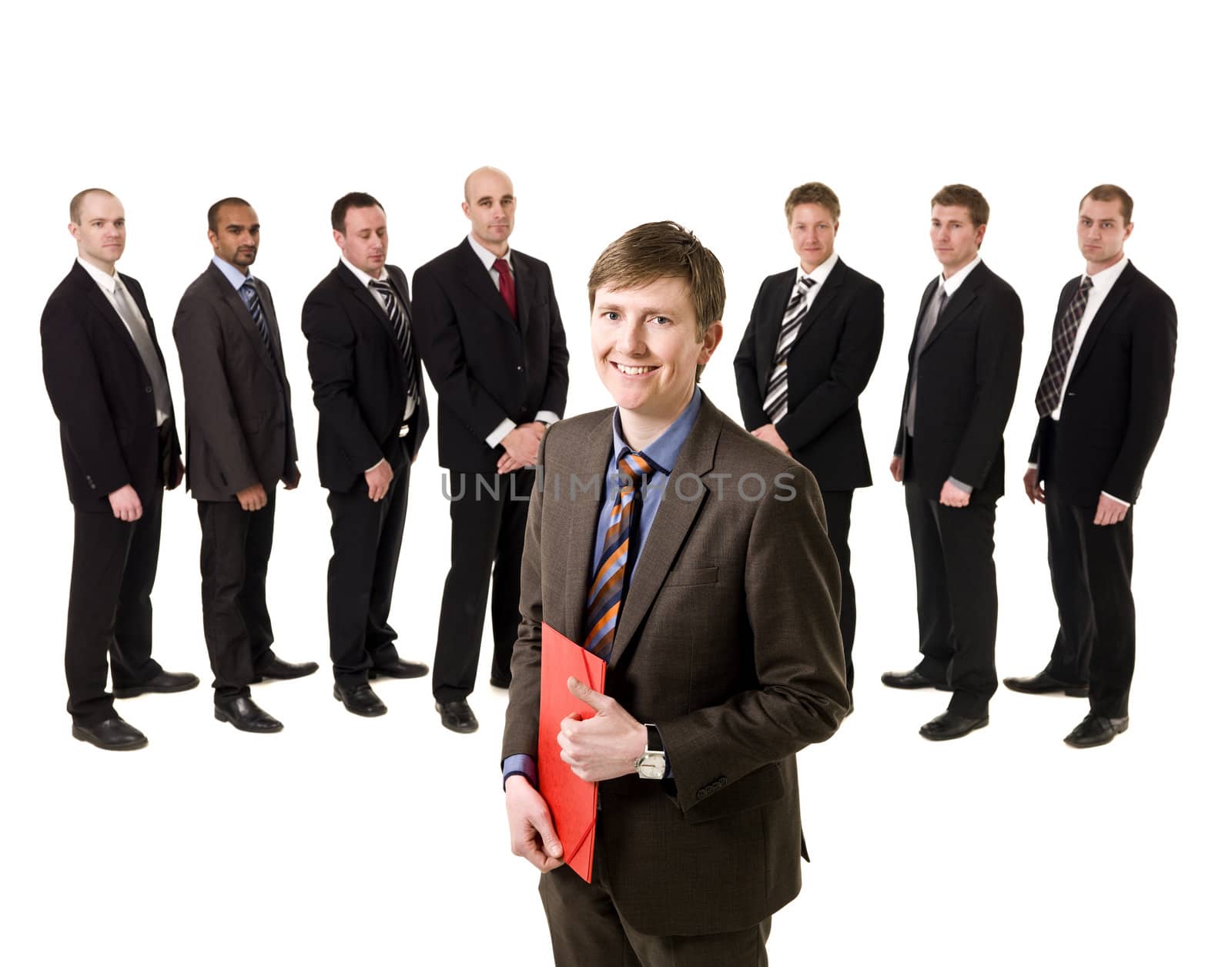 Man with a document in front of a group of men