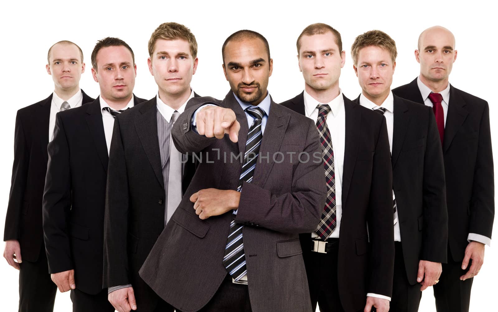 Man pointing standing in front of his team isolated on white background
