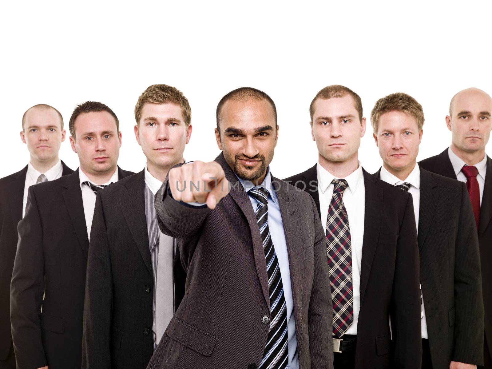 Pointing man in front of his team isolated on white background