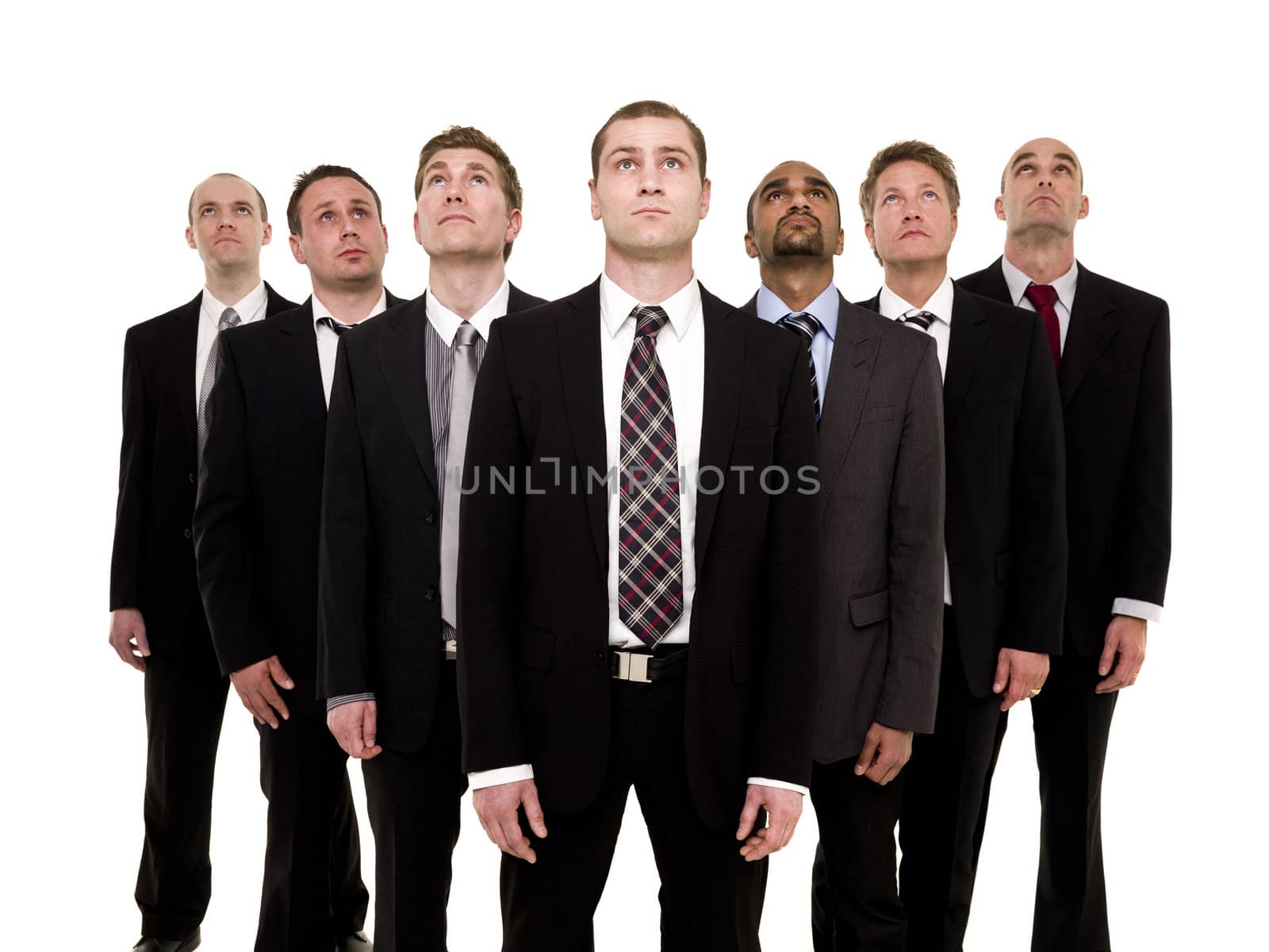 Confident team looking up isolated on white background