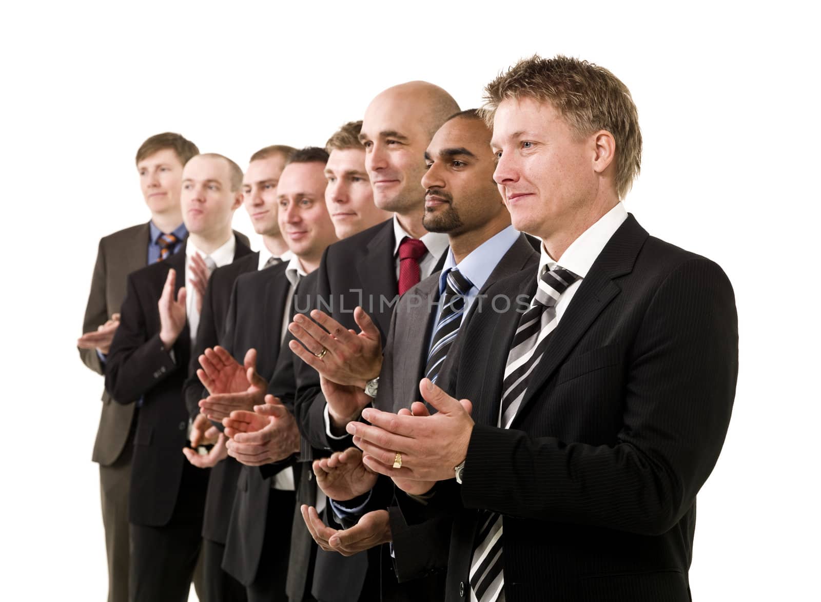 Business men clapping hands by gemenacom