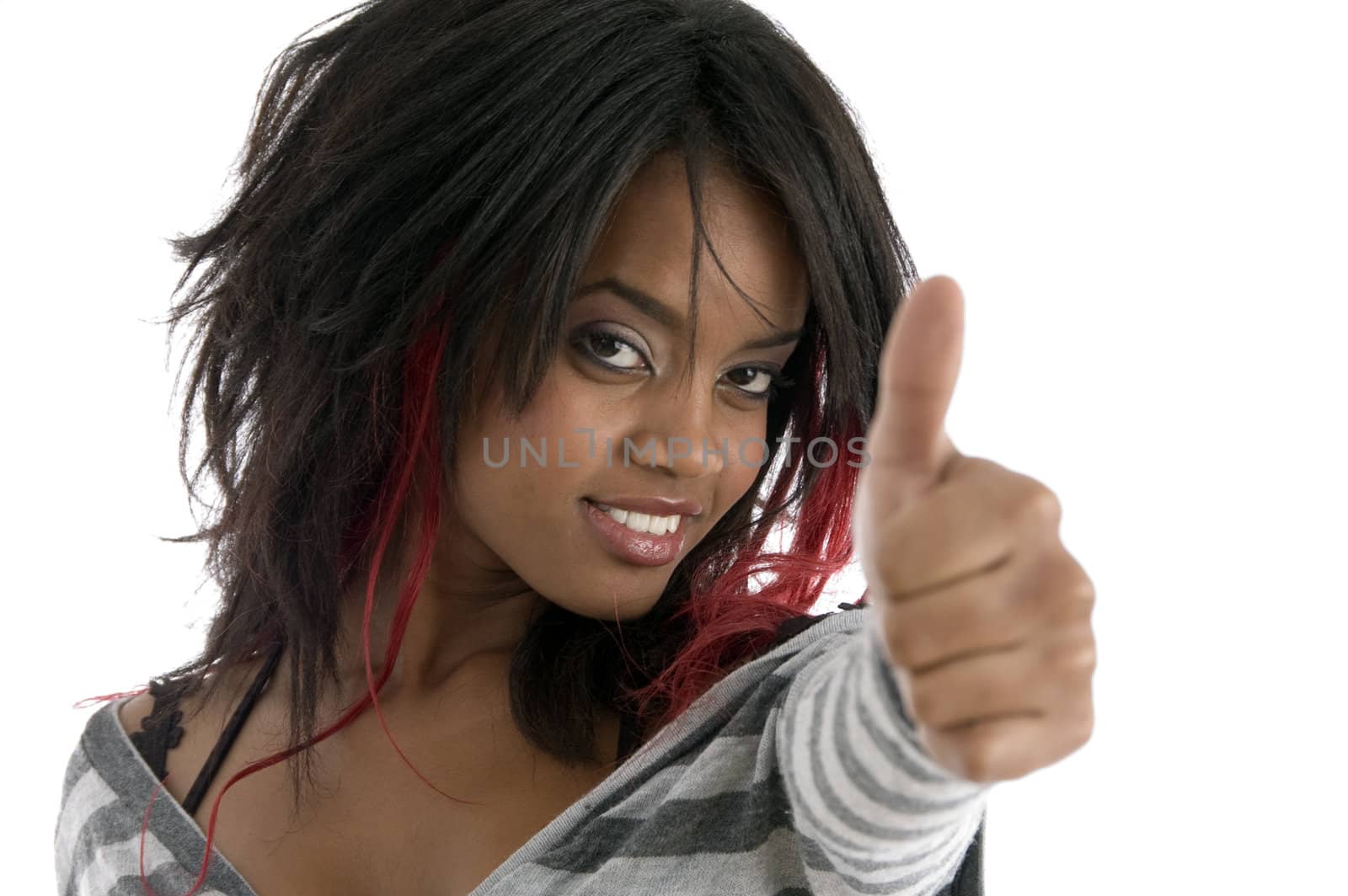 young girl wishing good luck against white background