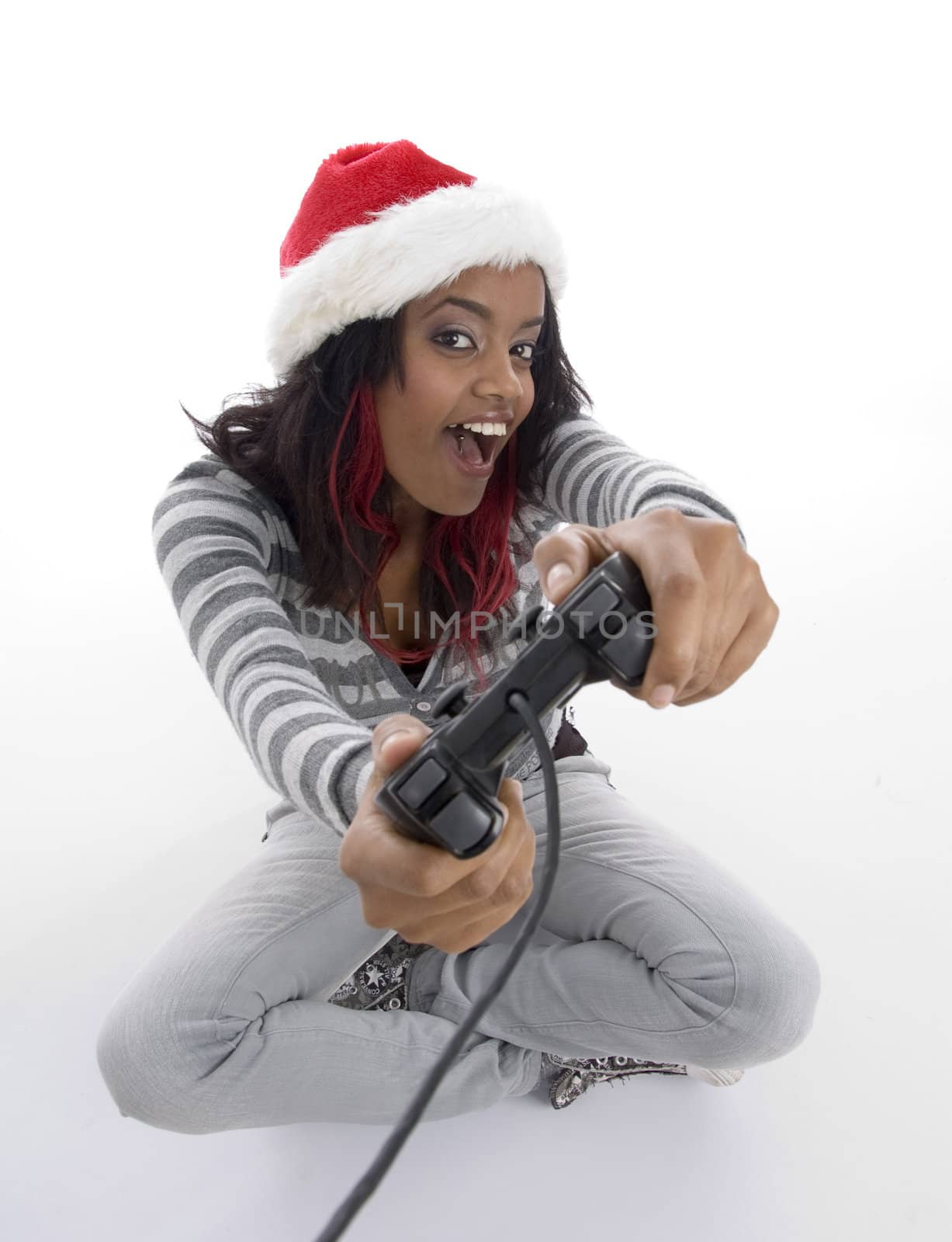 young girl showing remote with white background