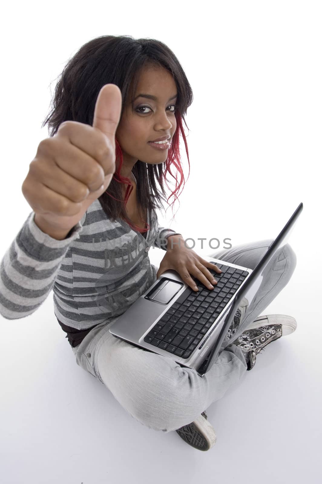 african girl with laptop on an isolated white background
