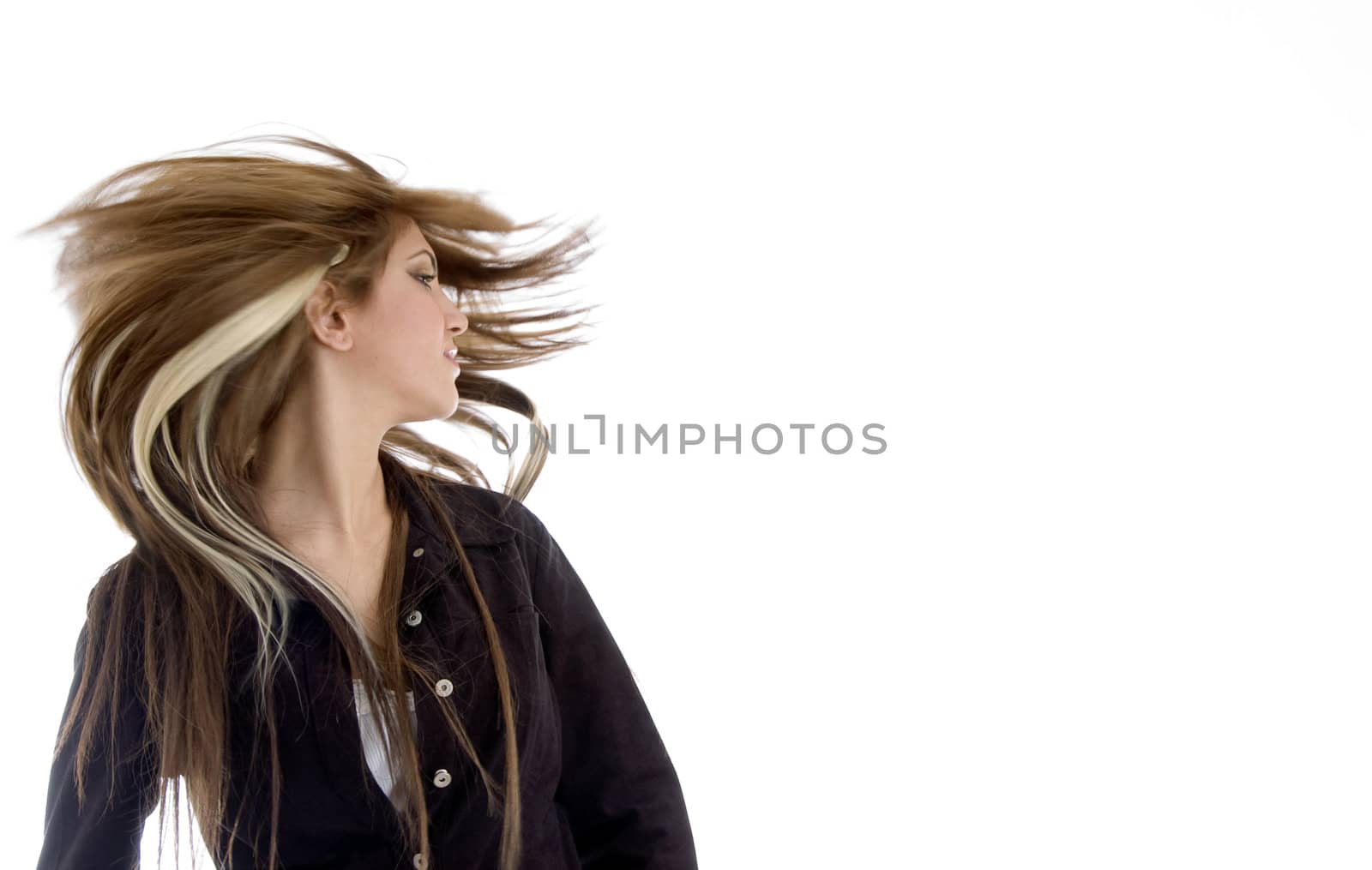 blonde girl with fluttered hair against white background