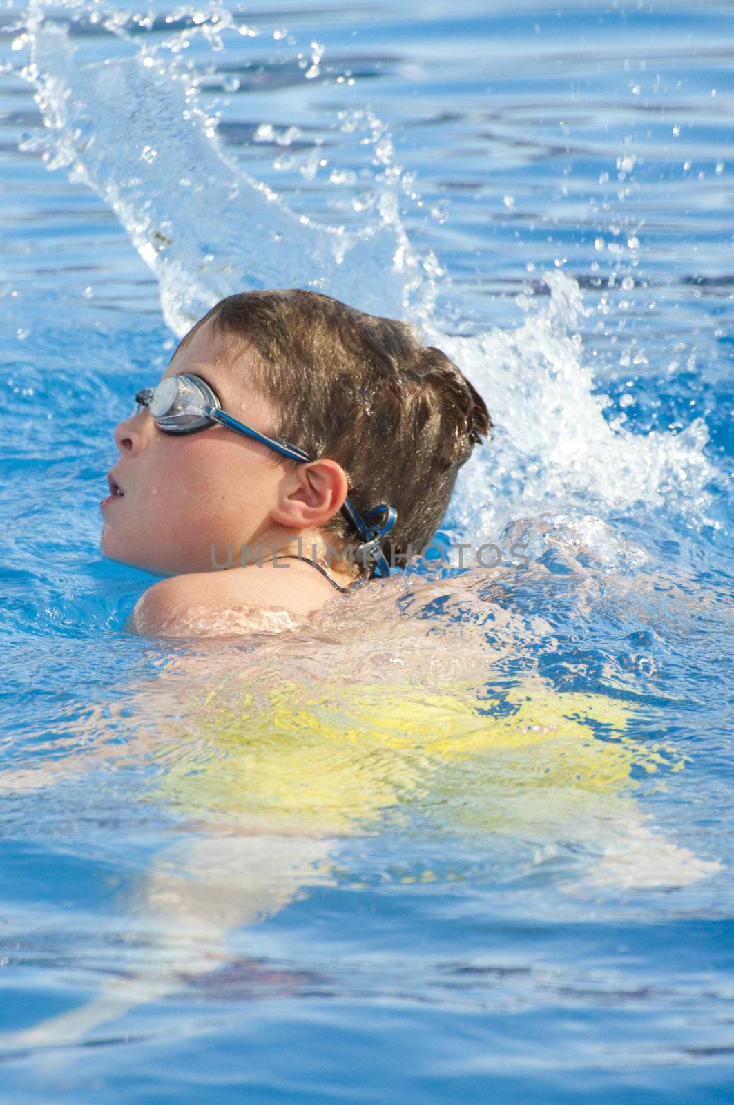 Picture of a boy on a swimming pool