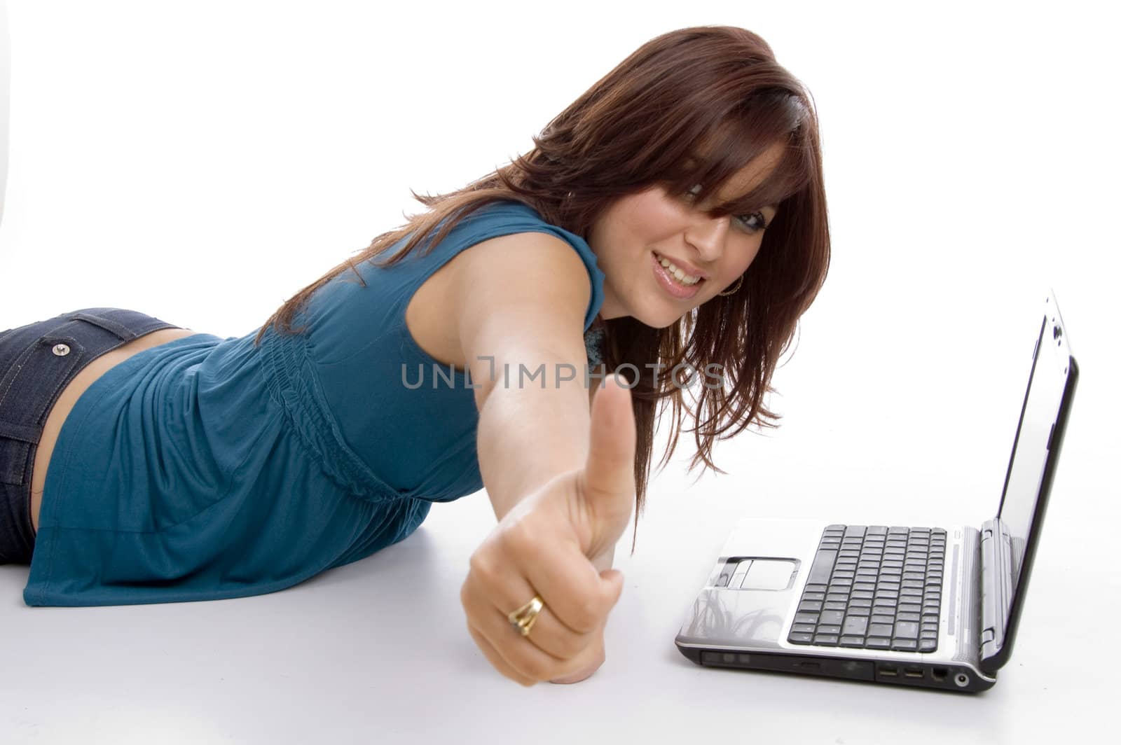 laying female with notebook and wishing good luck against white background