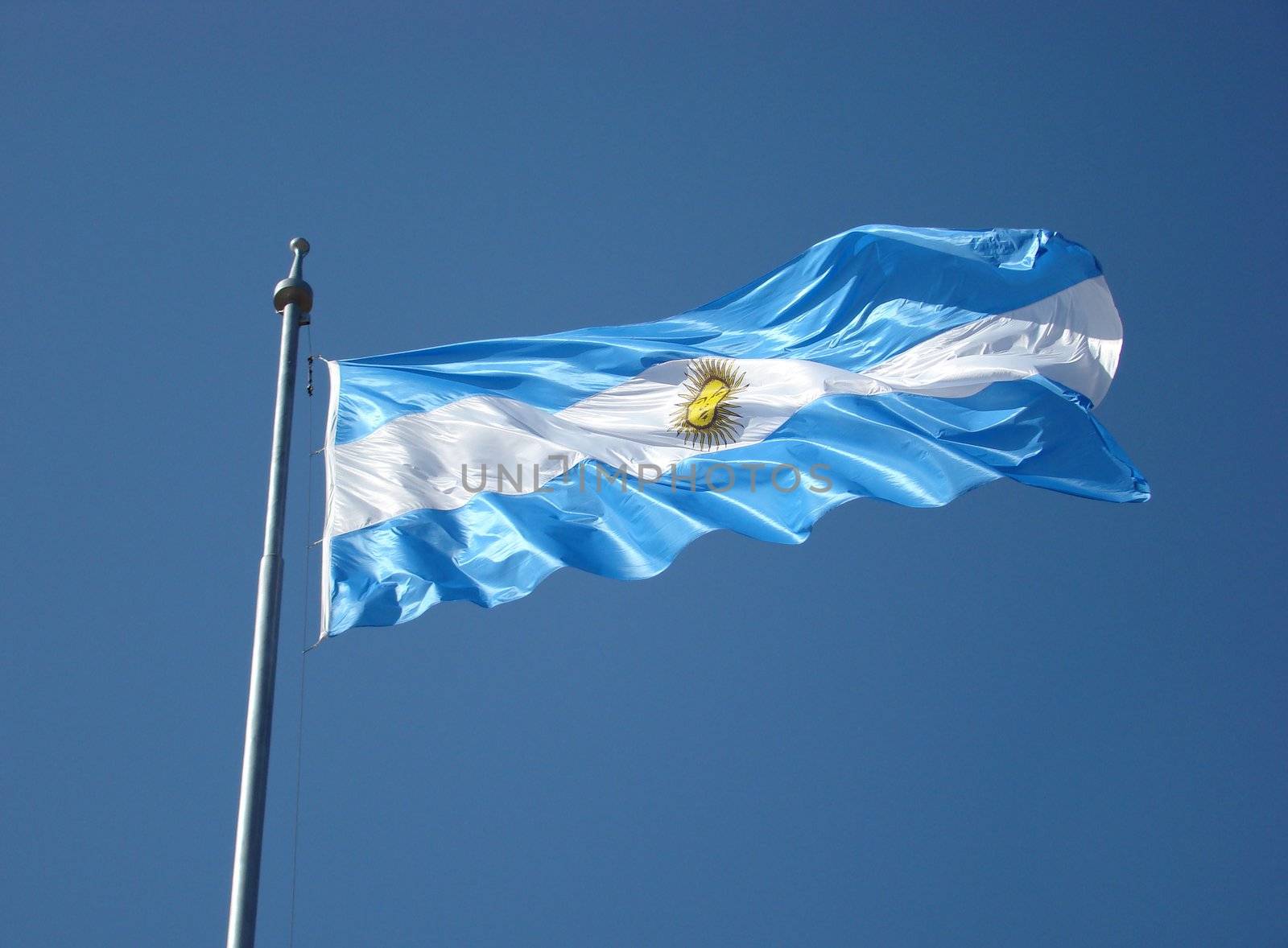 Argentina Flag on blue sky background.