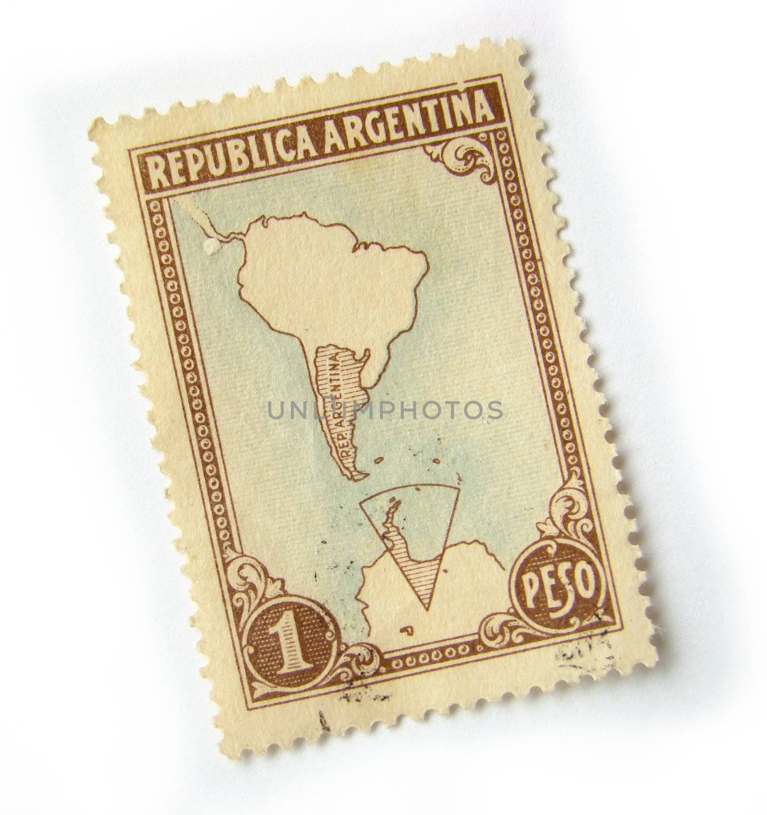 Old postage stamp from Argentina on white background.                