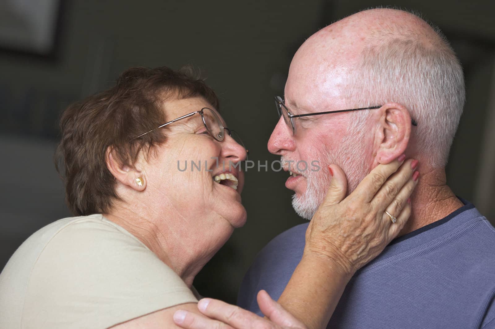 Happy Senior Adult Couple Facing Each Other