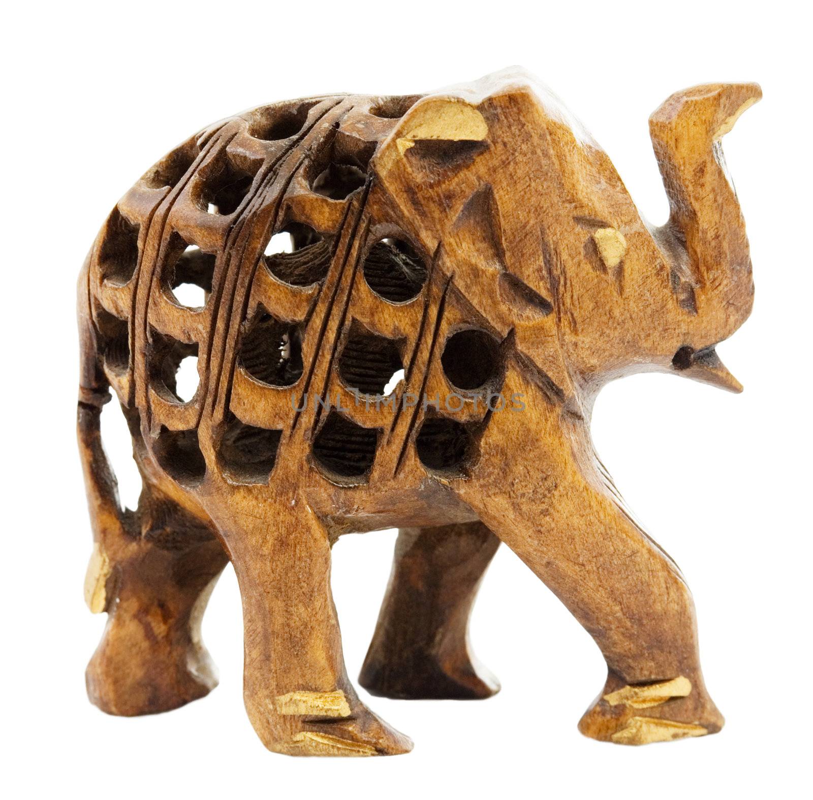Wooden hand-made  statuette of elephant a white background