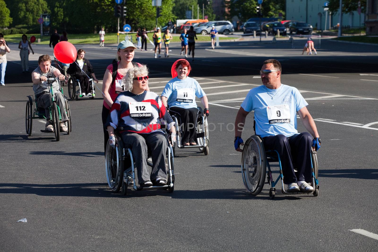 RIGA, LATVIA - MAY 23: Disabled people participate in the Riga International Marathon in May 23, 2010, Riga.