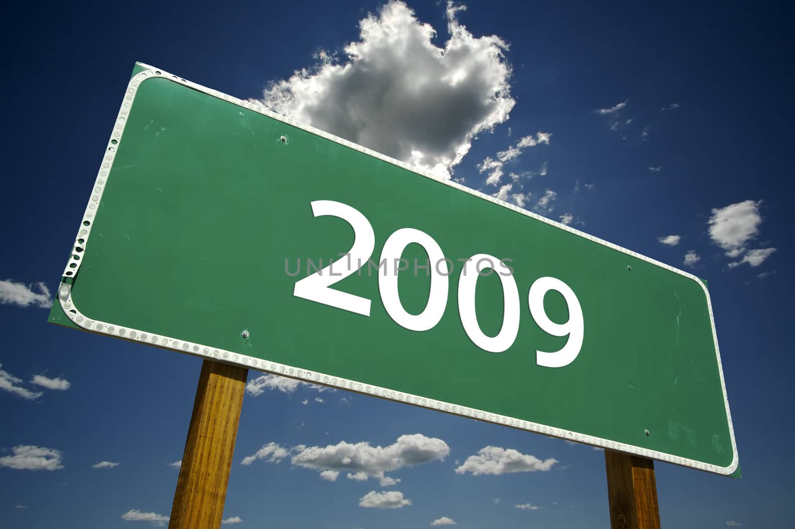 2009 Road Sign with dramatic clouds and sky.
