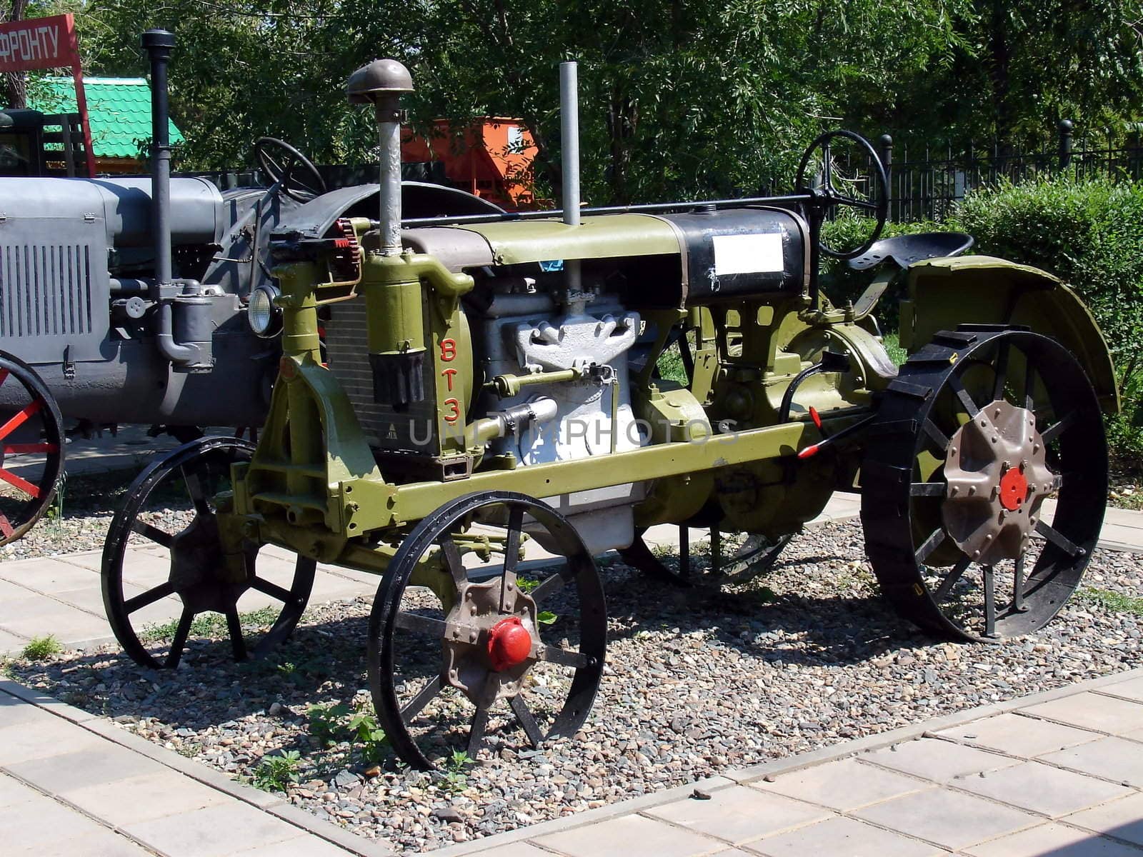 Red old tractor at the outdoor technique museum