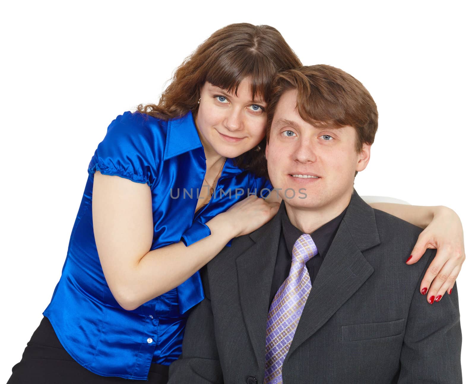 Portrait of a young couple in love on a white background