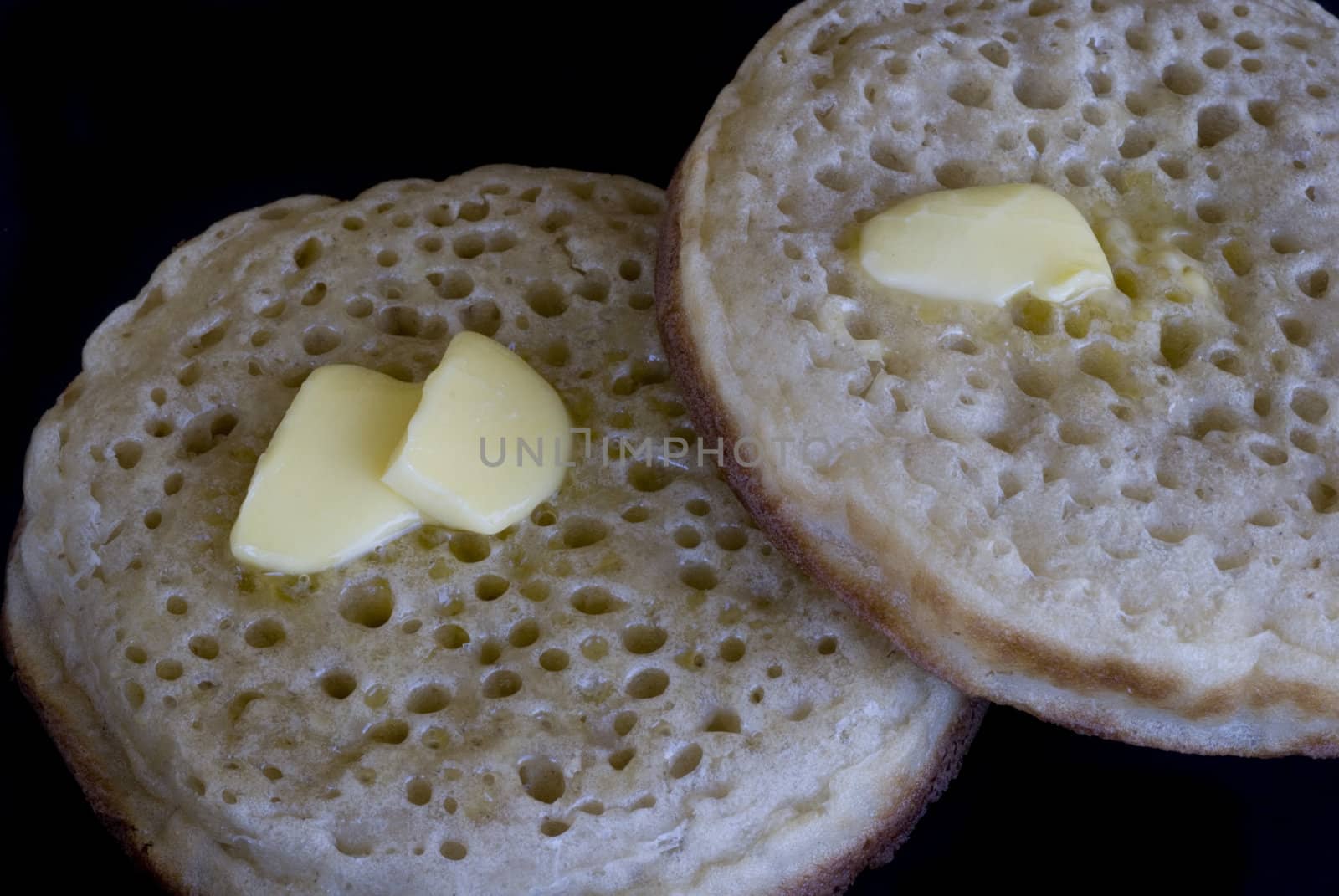 buttered crumpets by stockarch