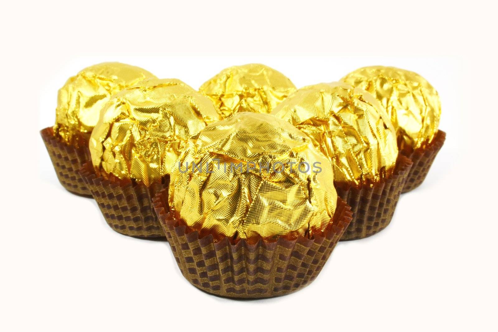 Fancy Chocolates Wrapped in Tin Gold Foil