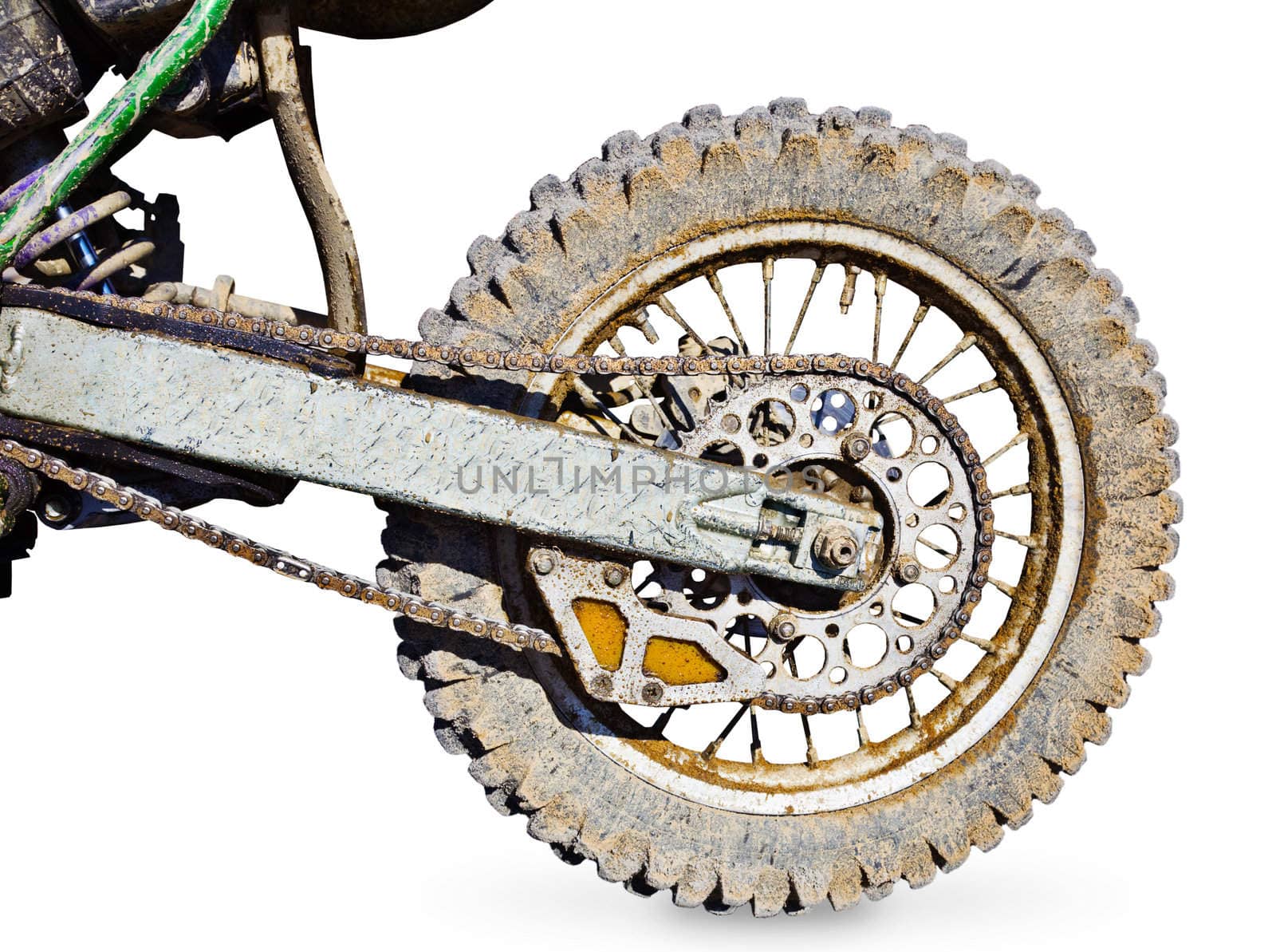 Rear wheel motorcycle for trial covered with mud isolated on white background