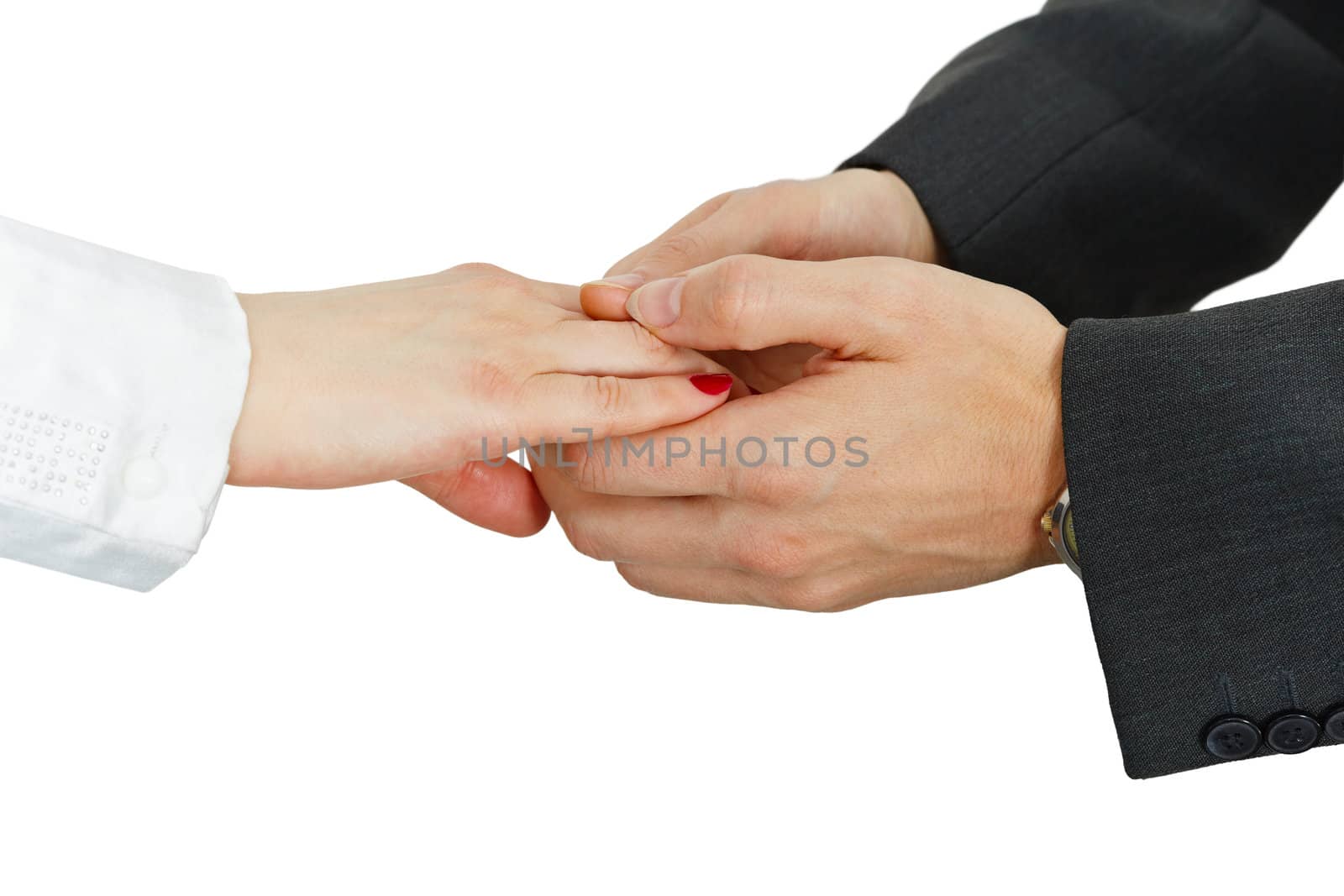 Women's hand in the men's hands, isolated on a white background