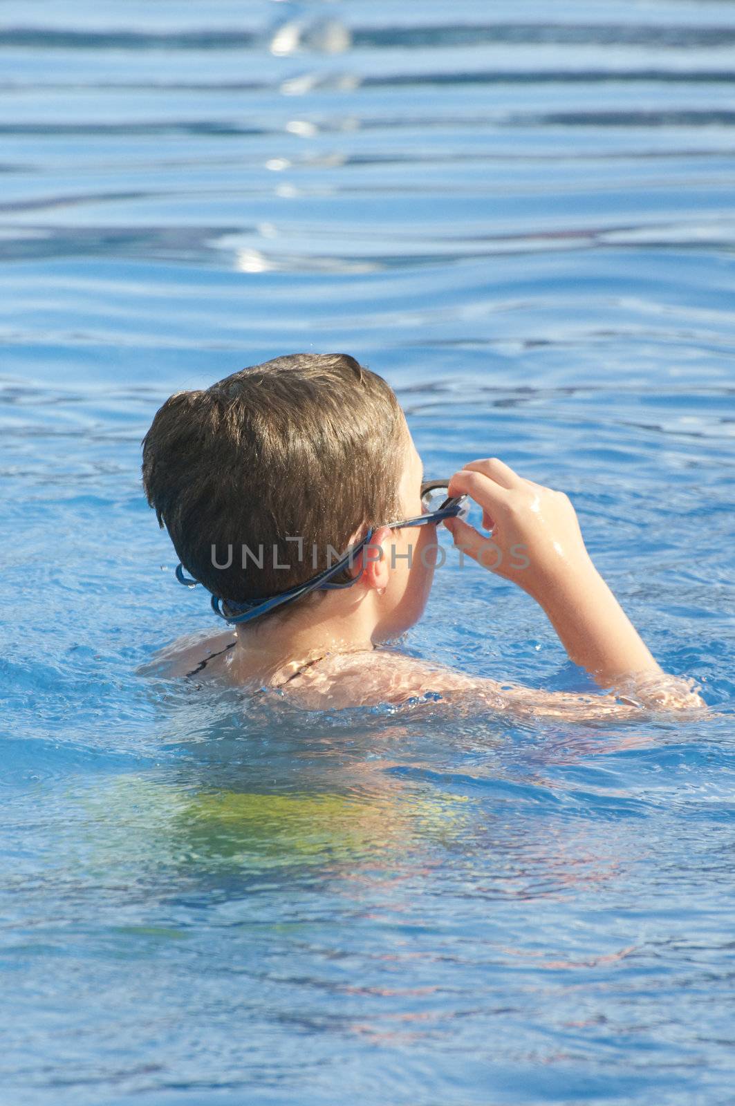 Picture of a boy on a swimming pool