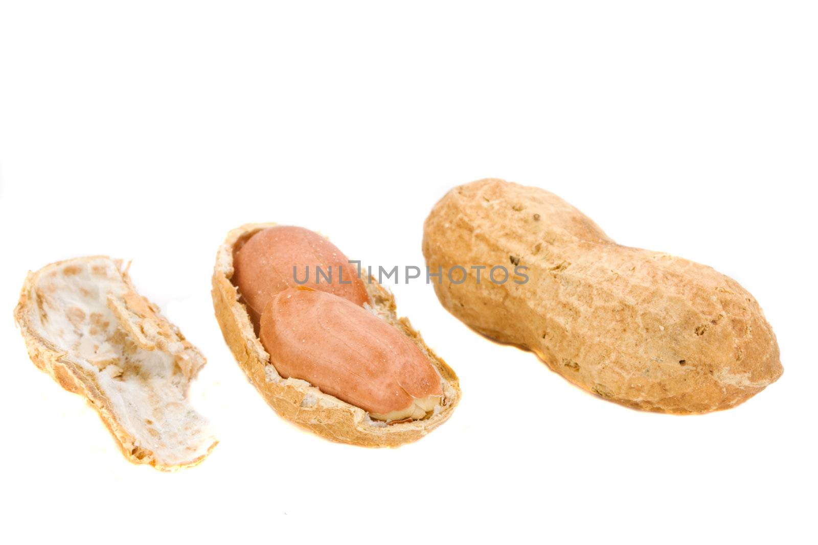 some natural peanuts on white background