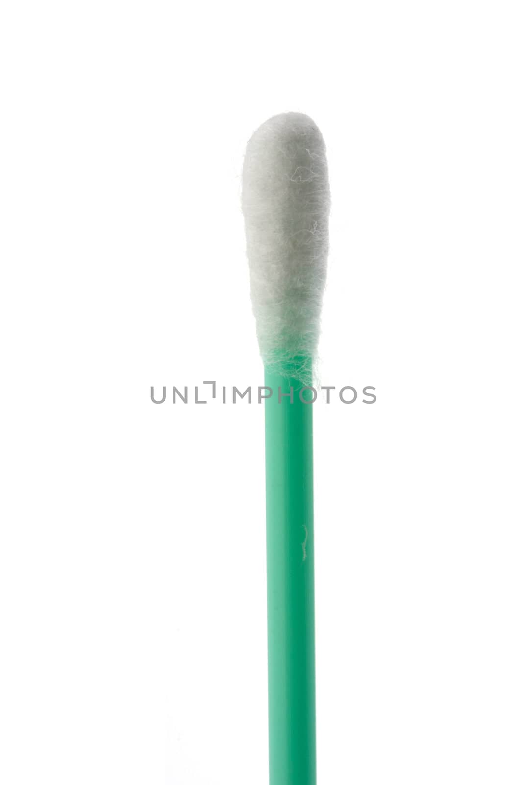 detail of a single cotton swab on white background