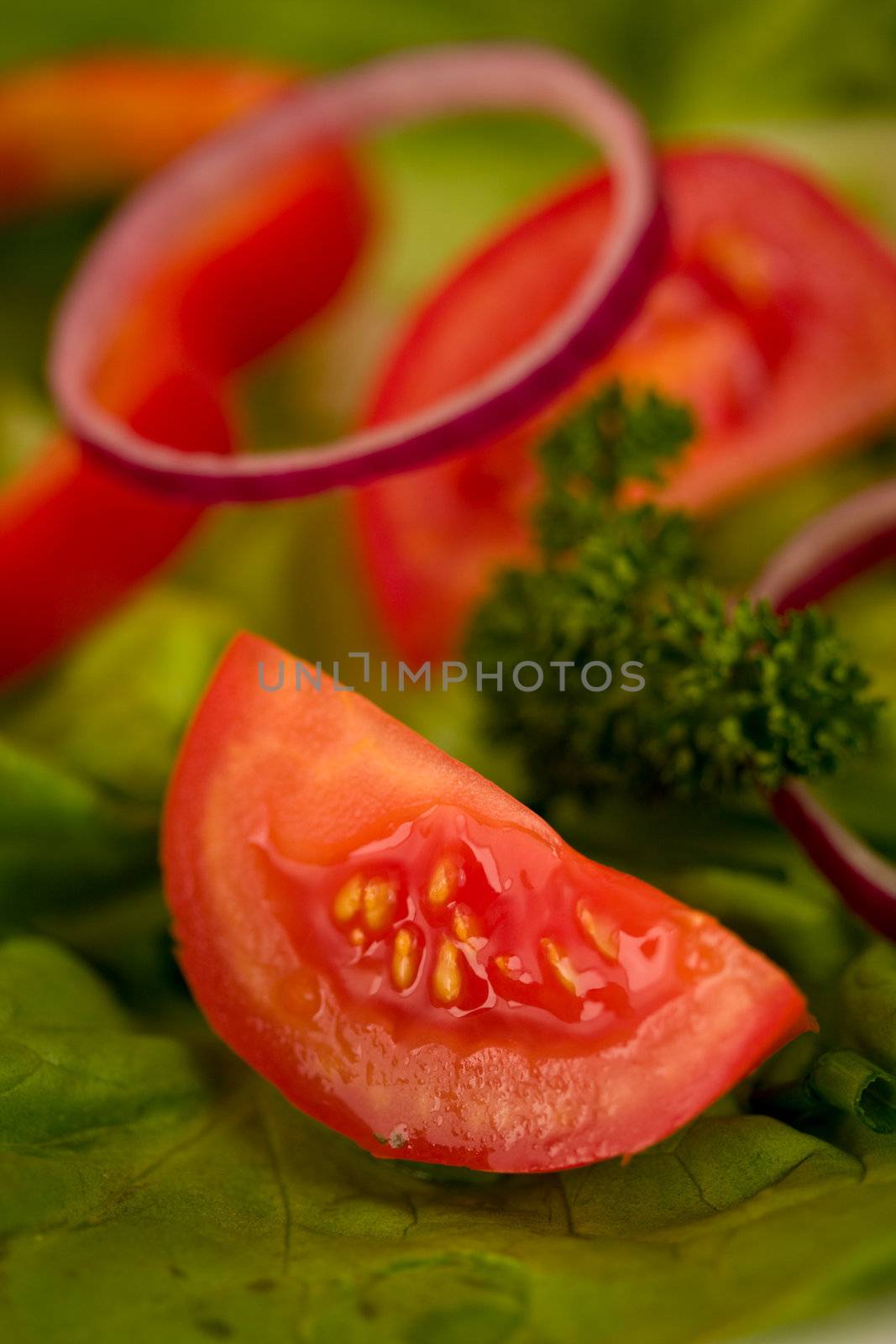 tomato slice on salad