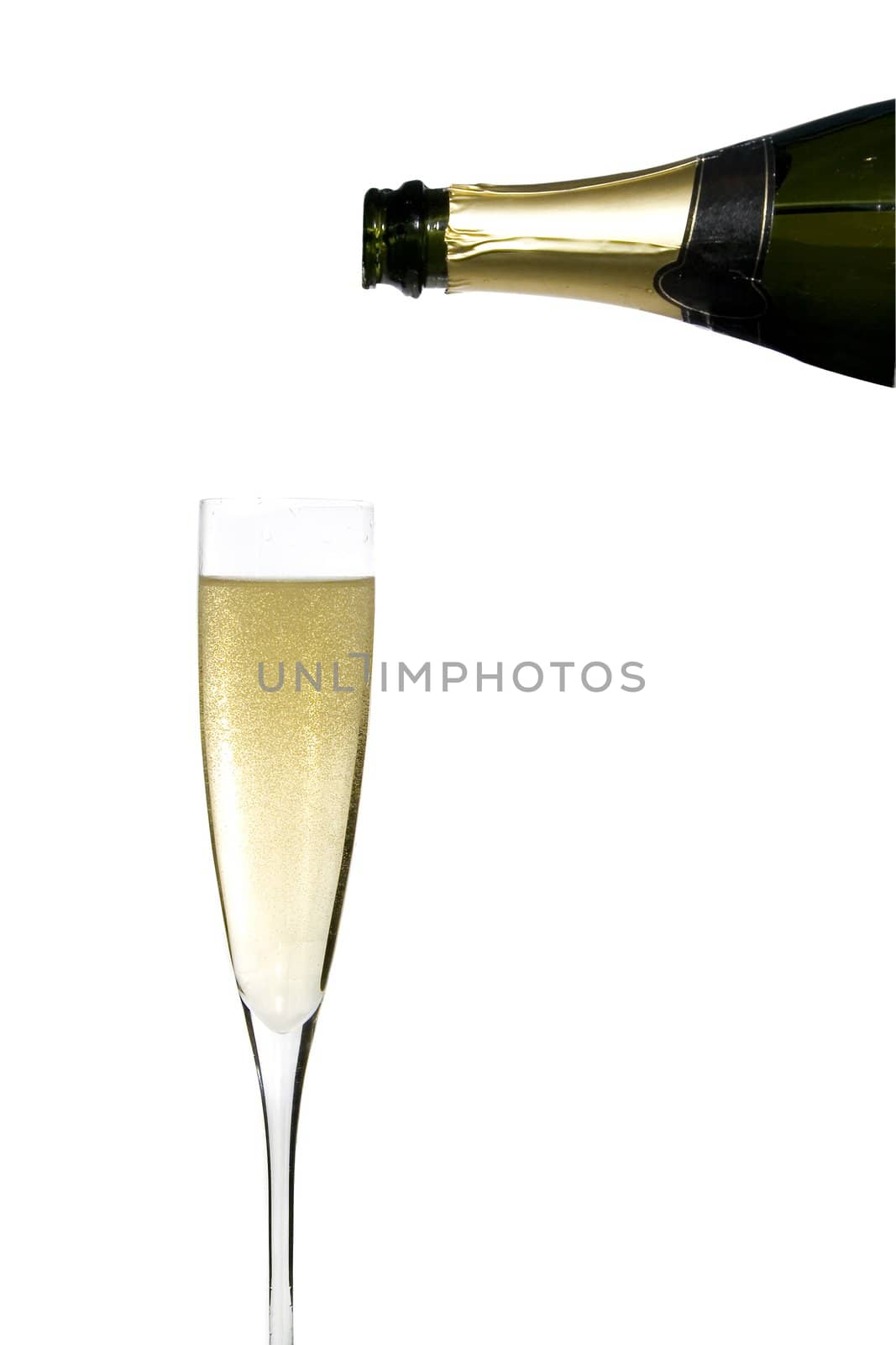 filling a glass cup with champagne wine isolated on withe background