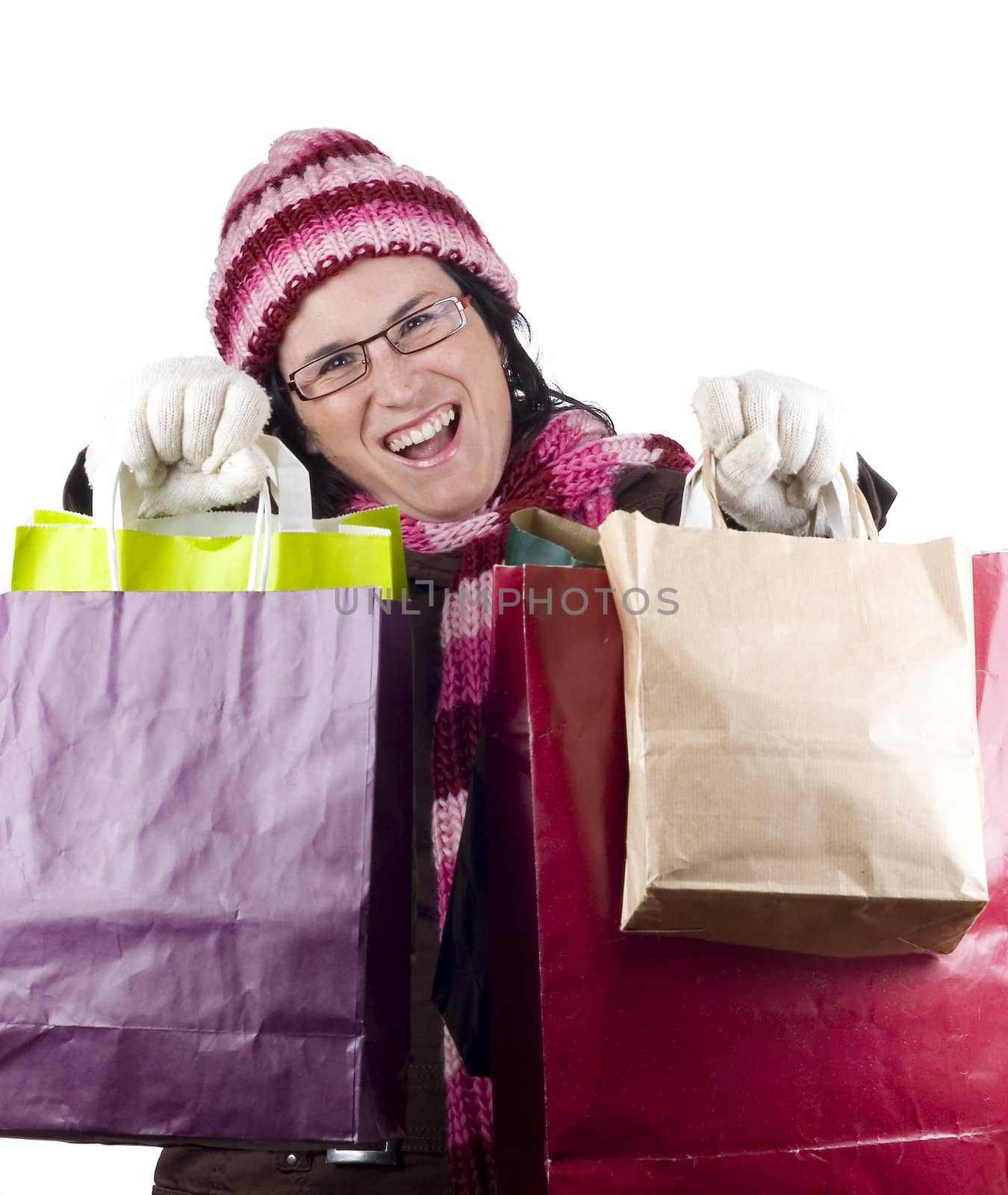 Consumerist Christmas girl with bags in a shopping day