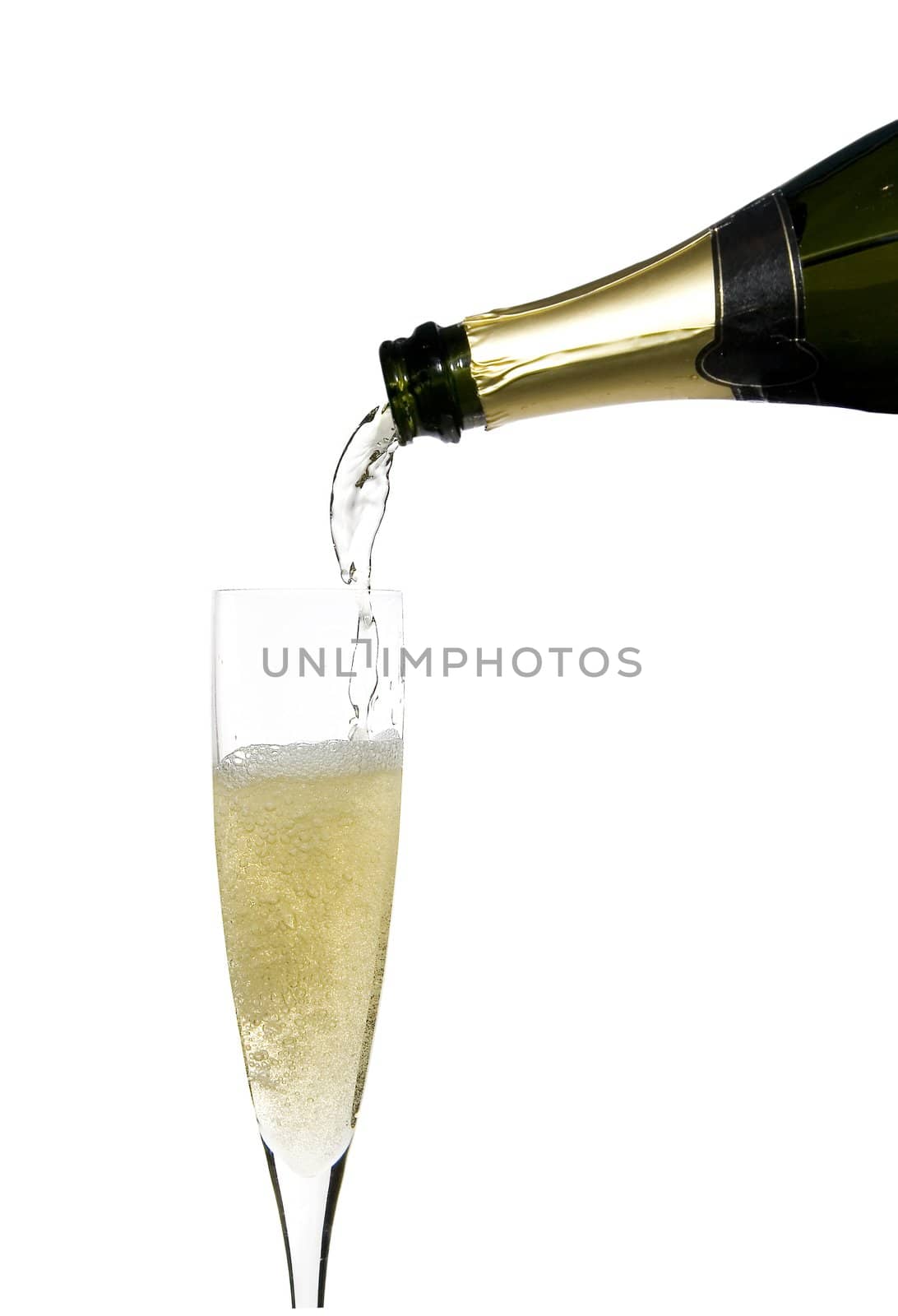 filling a glass cup with champagne wine isolated on withe background