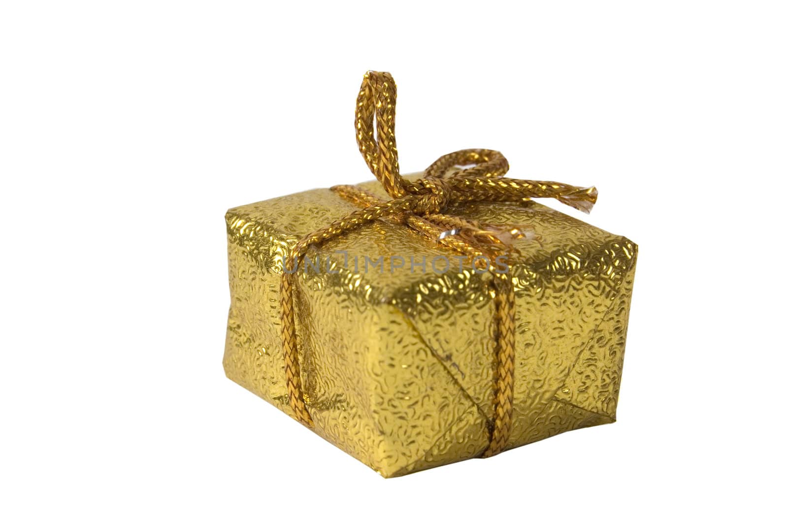 present wrapped in gold paper on a white background