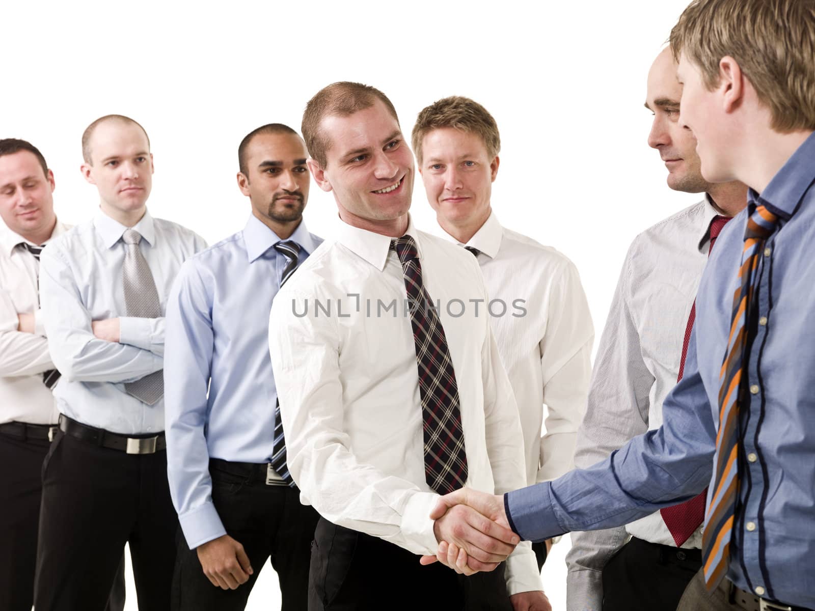 Businesspeople shaking hands by gemenacom