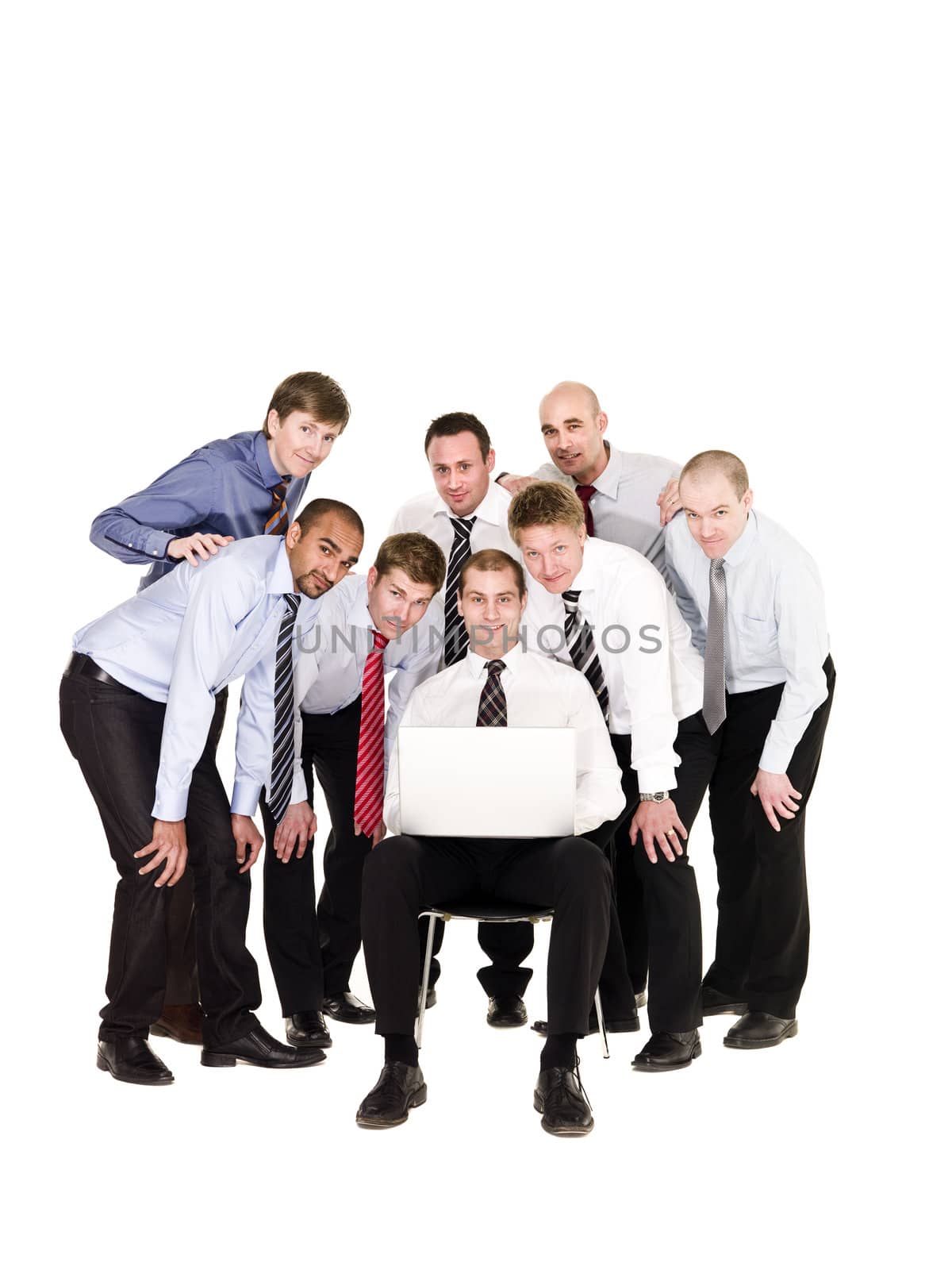 Group of businessmen in front of a laptop isolated on white background