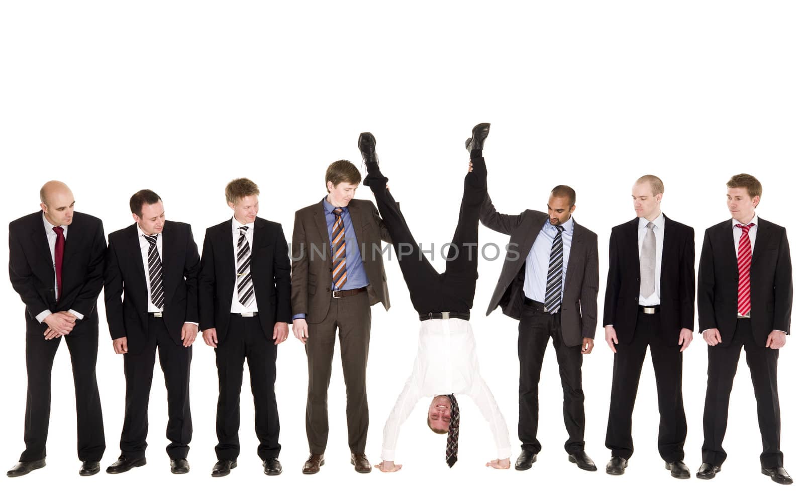 Group of businessmen with the boss upside down