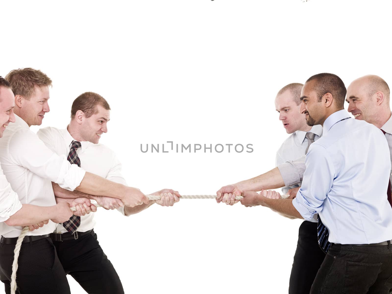 Businessmen in a tug-of-war isolated on white background