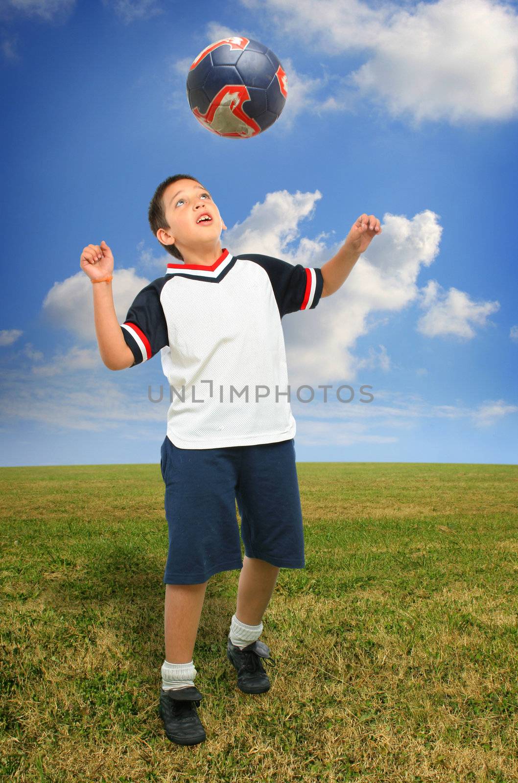 Sports. Boy playing soccer (ball on air). From my football series