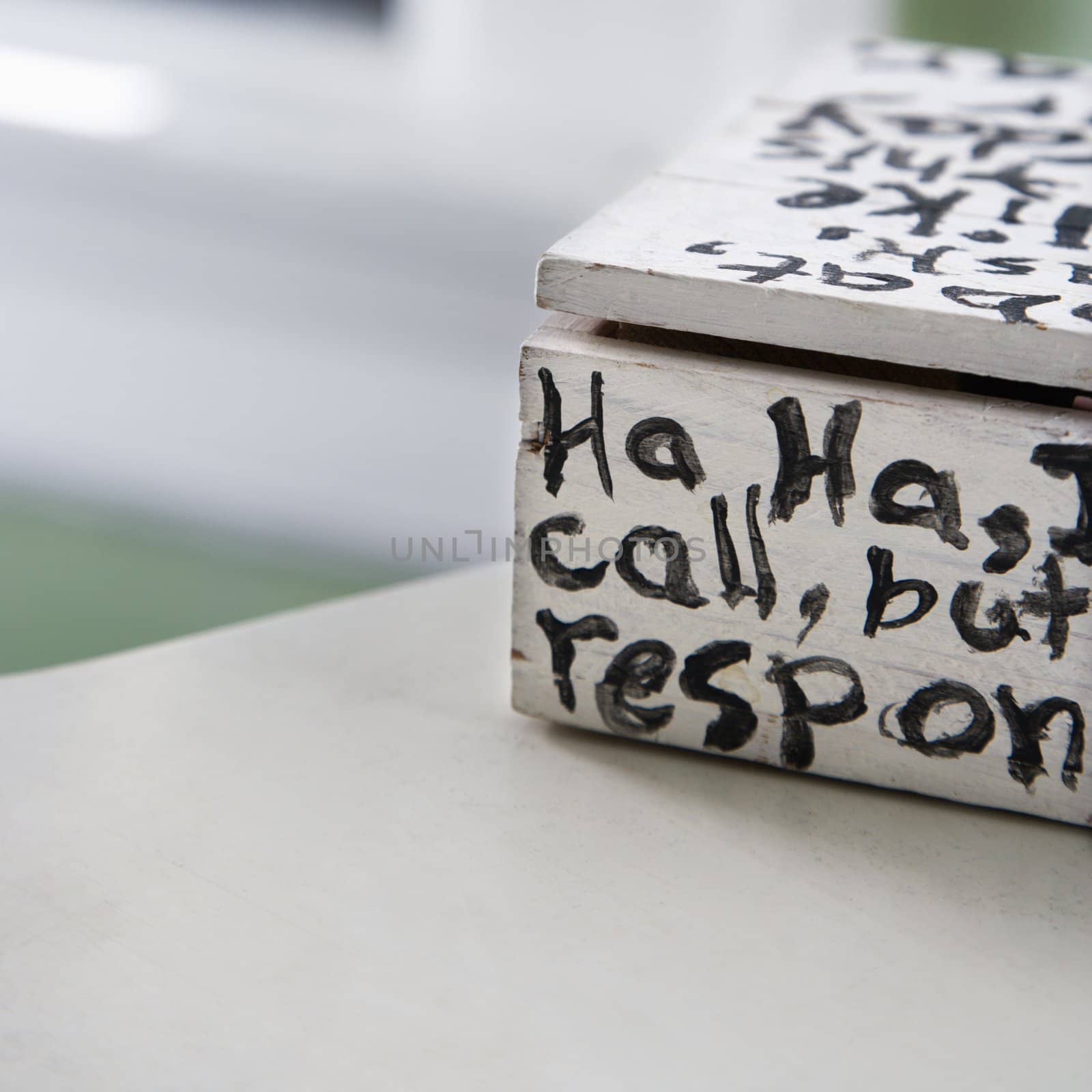 Hand painted box with text starting with ha ha.
