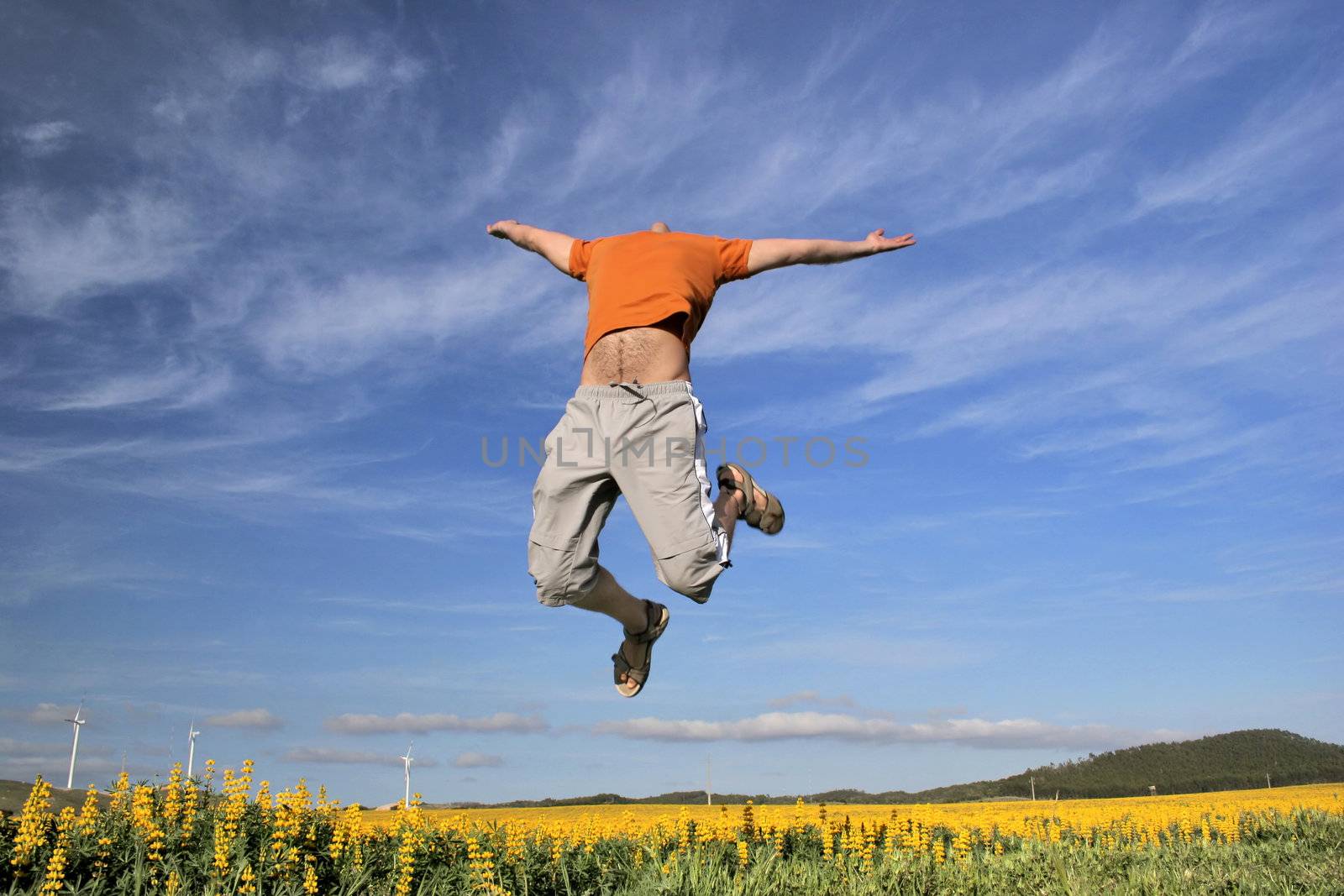 Jump to the sky over a flowery field