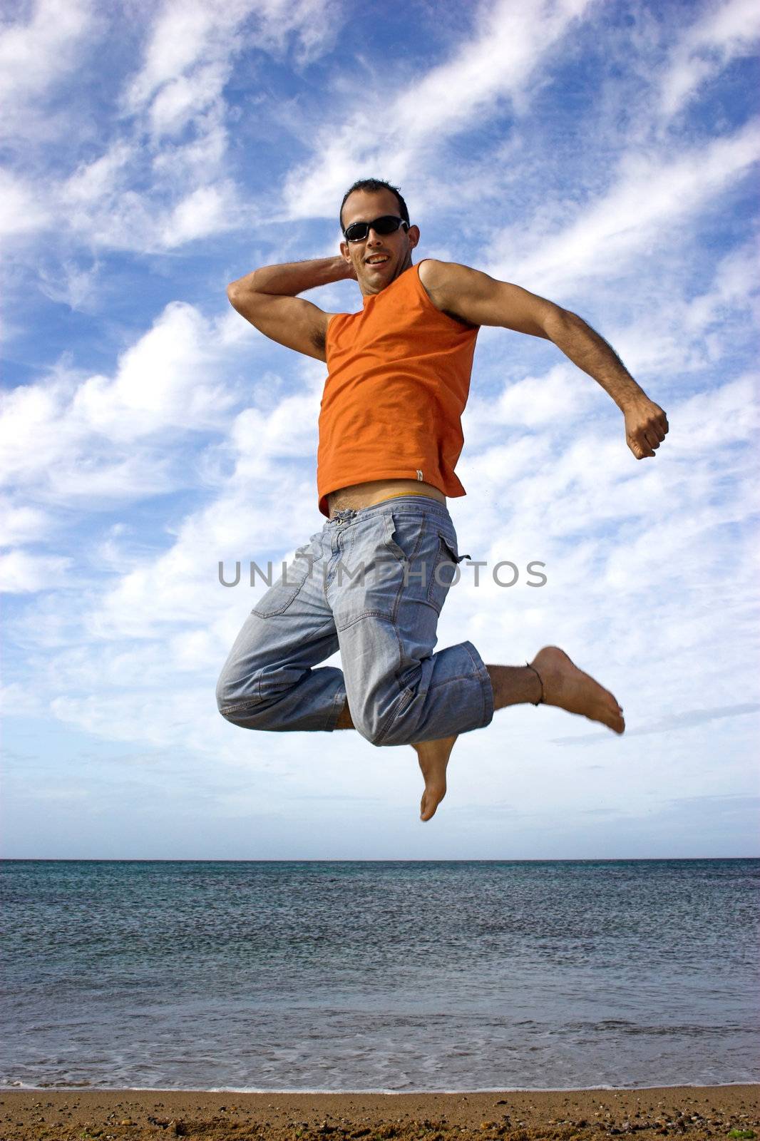 Young active man making a big jump by Iko