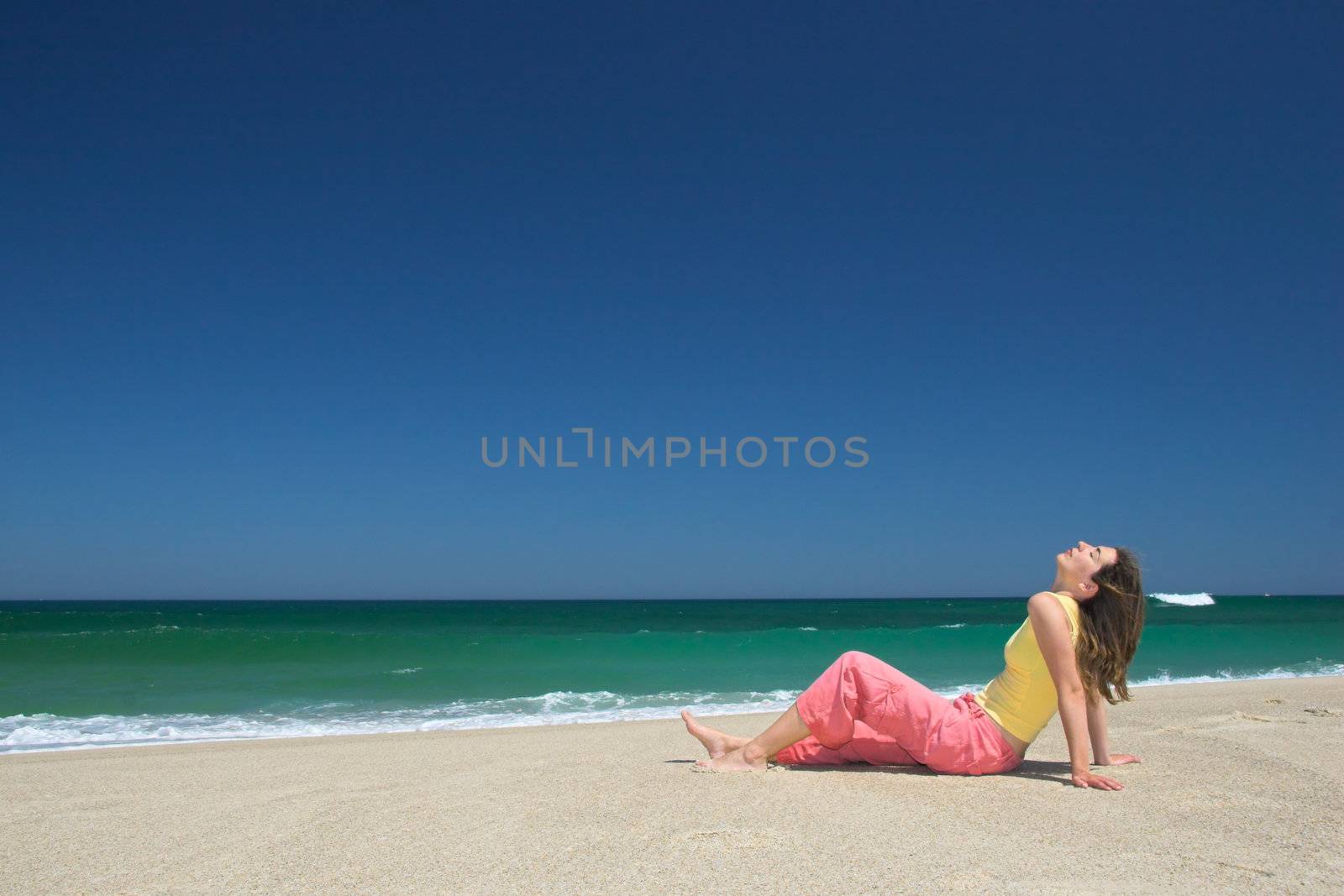 Beautiful young woman relax in the beach