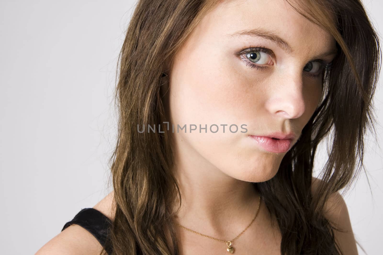 young beautiful woman portrait on white background
