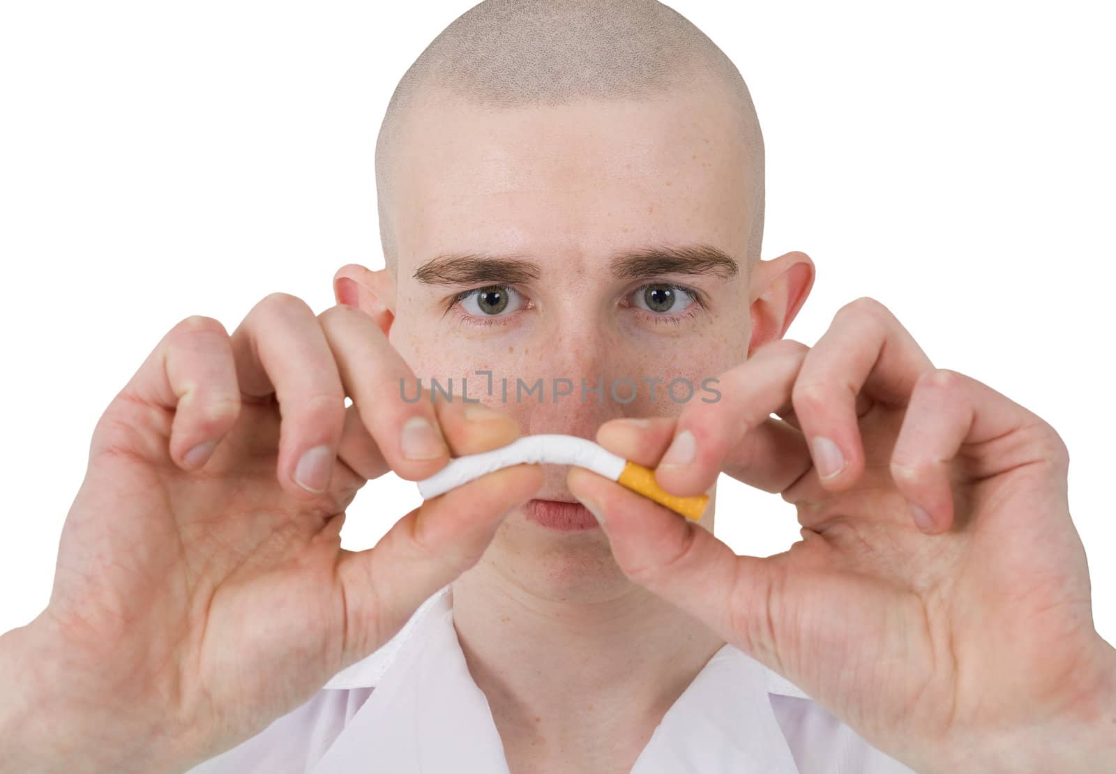 The man breaks cigarette on a white background
