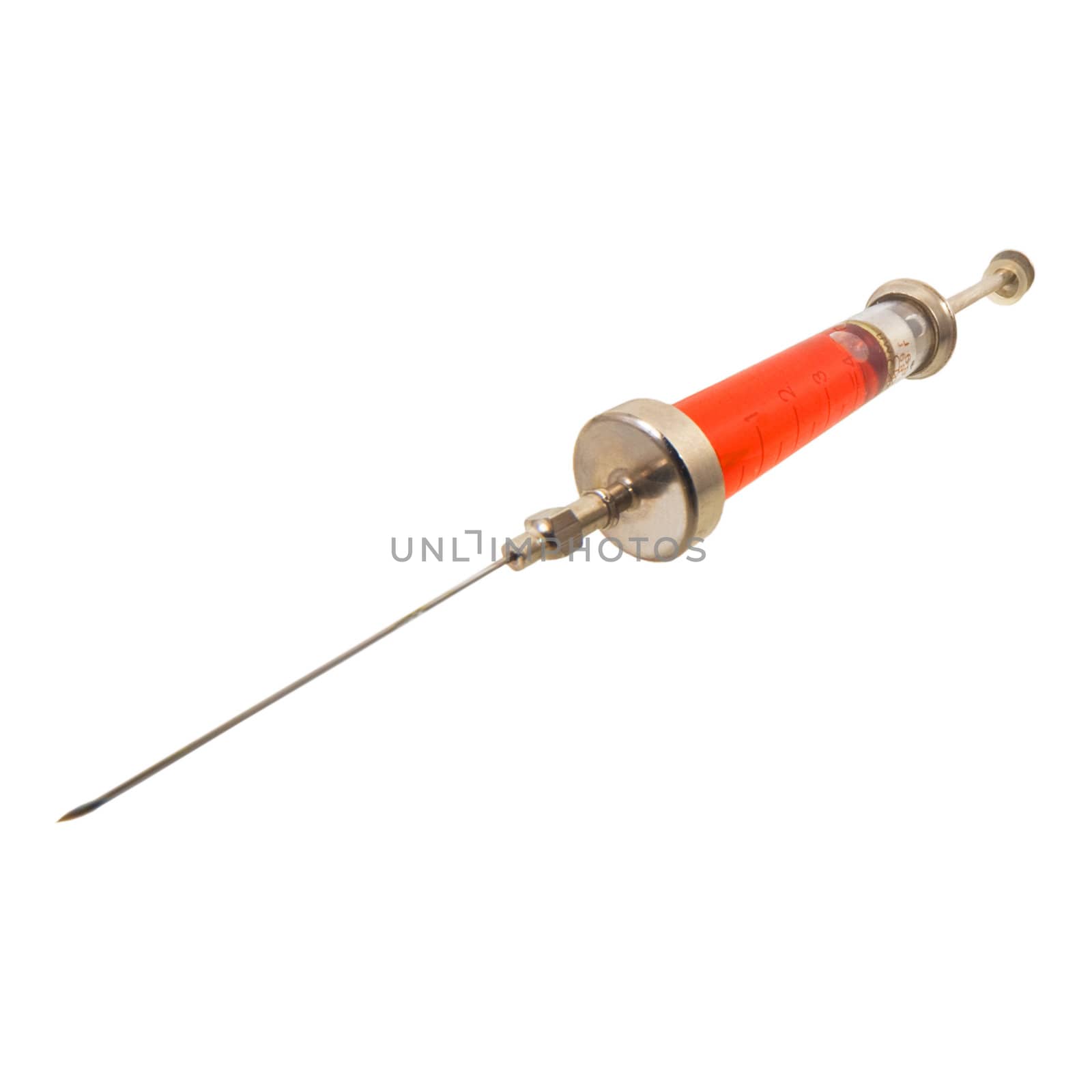 Glass syringe with a long needle on a white background