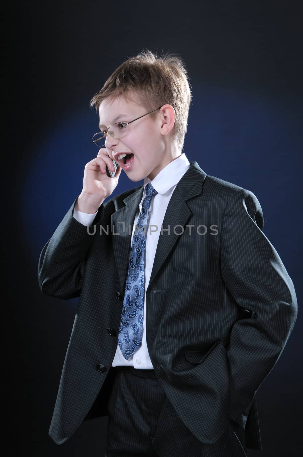 Boy in Suit on Cellphone by dyoma