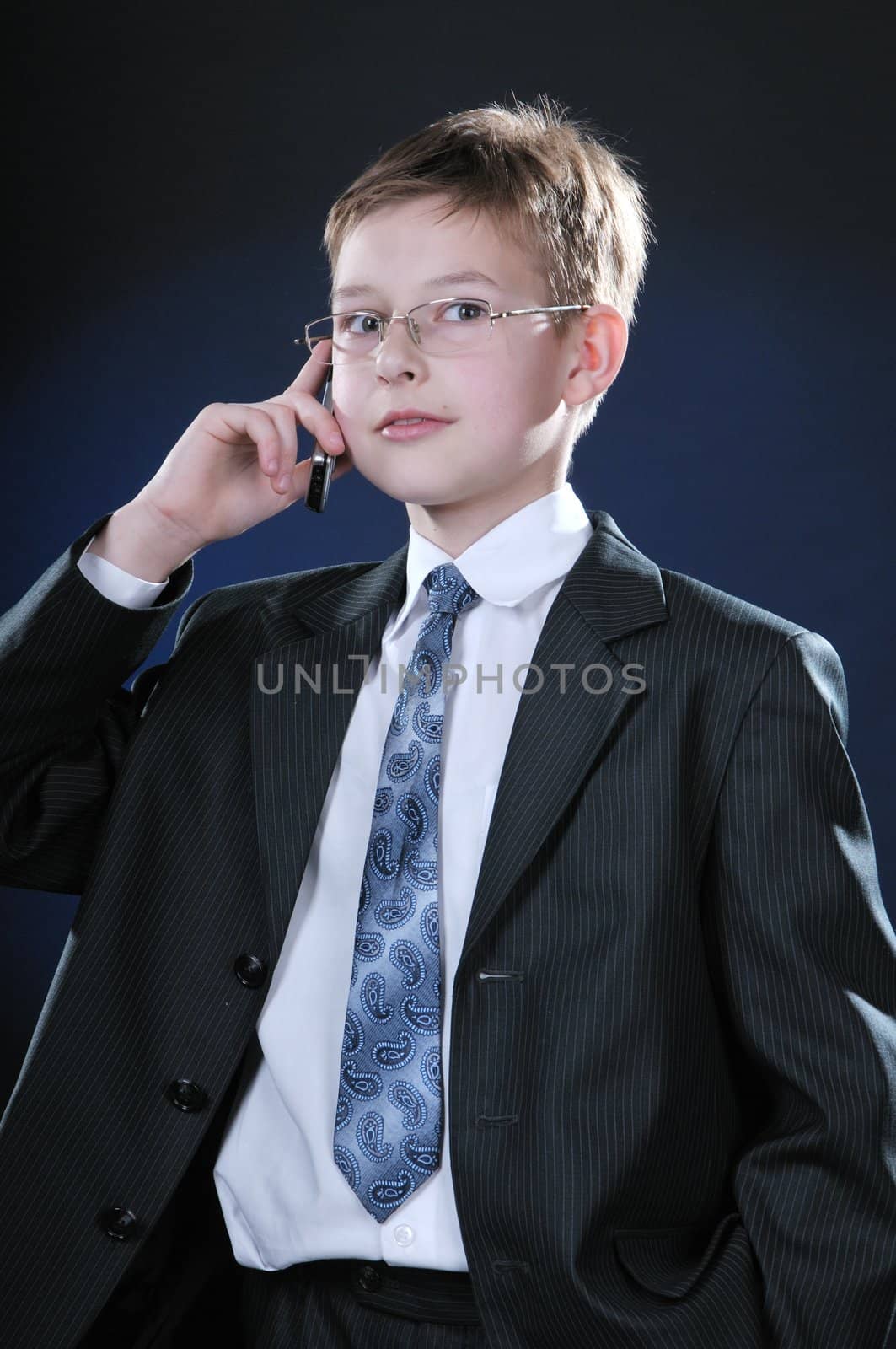 Boy in Suit on Cellphone by dyoma
