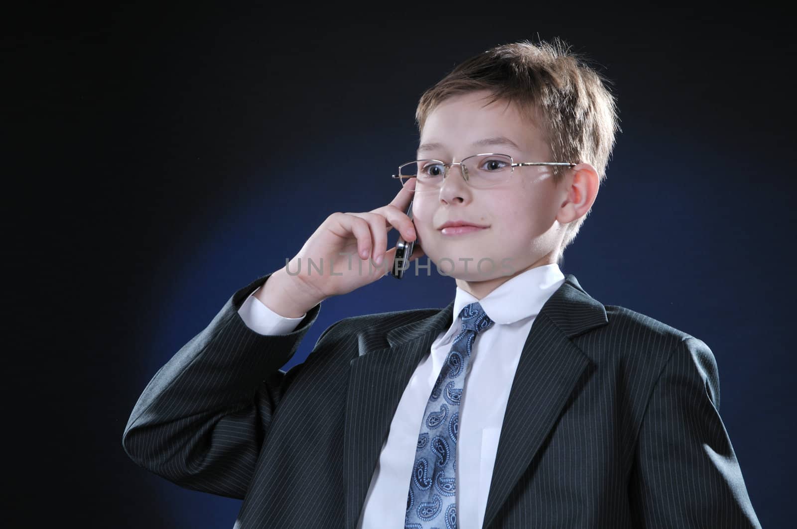 Teen discussing important business on the cell phone