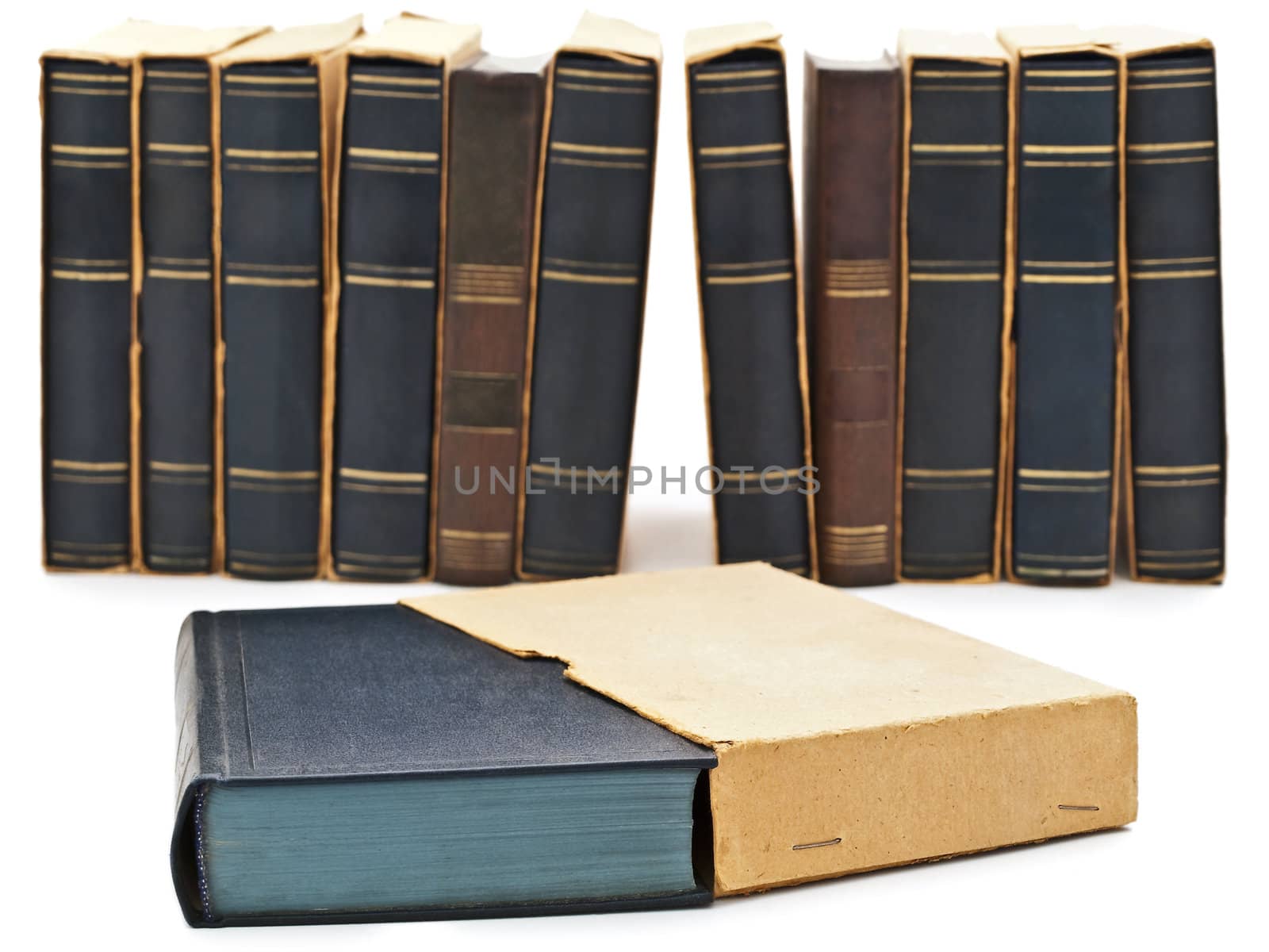  Photo of old books row at white background