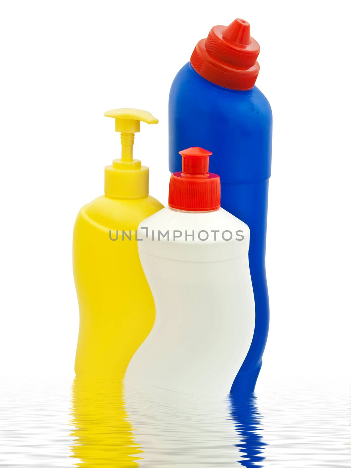 Detergent bottles over white background