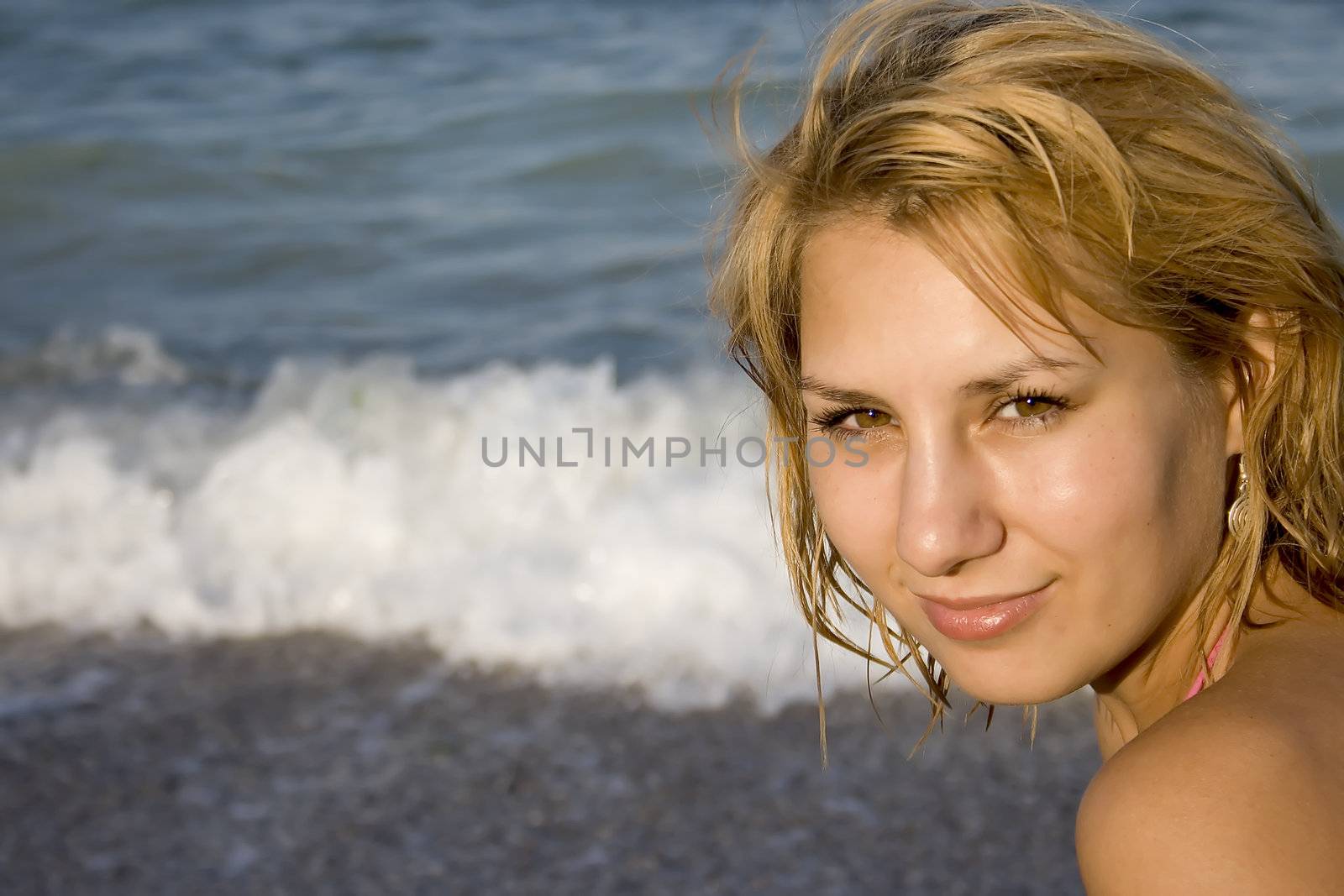 portrait of a beautiful girl at the beach